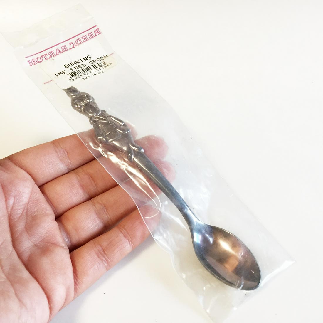 REED&BARTON Bunnykins Silverplate infant feeding spoon: REED&BARTON Bunnykins Silverplate infant feeding spoon. Unopened, still sealed in plastic. Length 5 1/2 inches. Made in USA. Condition very good.