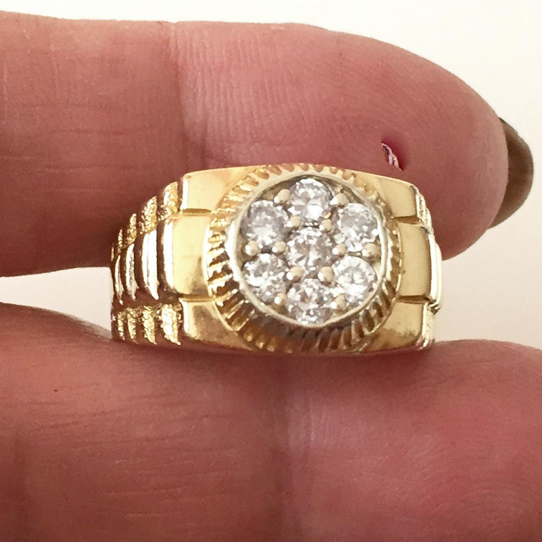10KT Yellow gold Rolex style CZ ring size 10.5: 10KT Yellow gold Rolex watch style, clear CZ ring size 10.5. Weight 6.7 grams. Top measured 1/2 inches wide. Hallmarked 10K ASK. Condition very good.