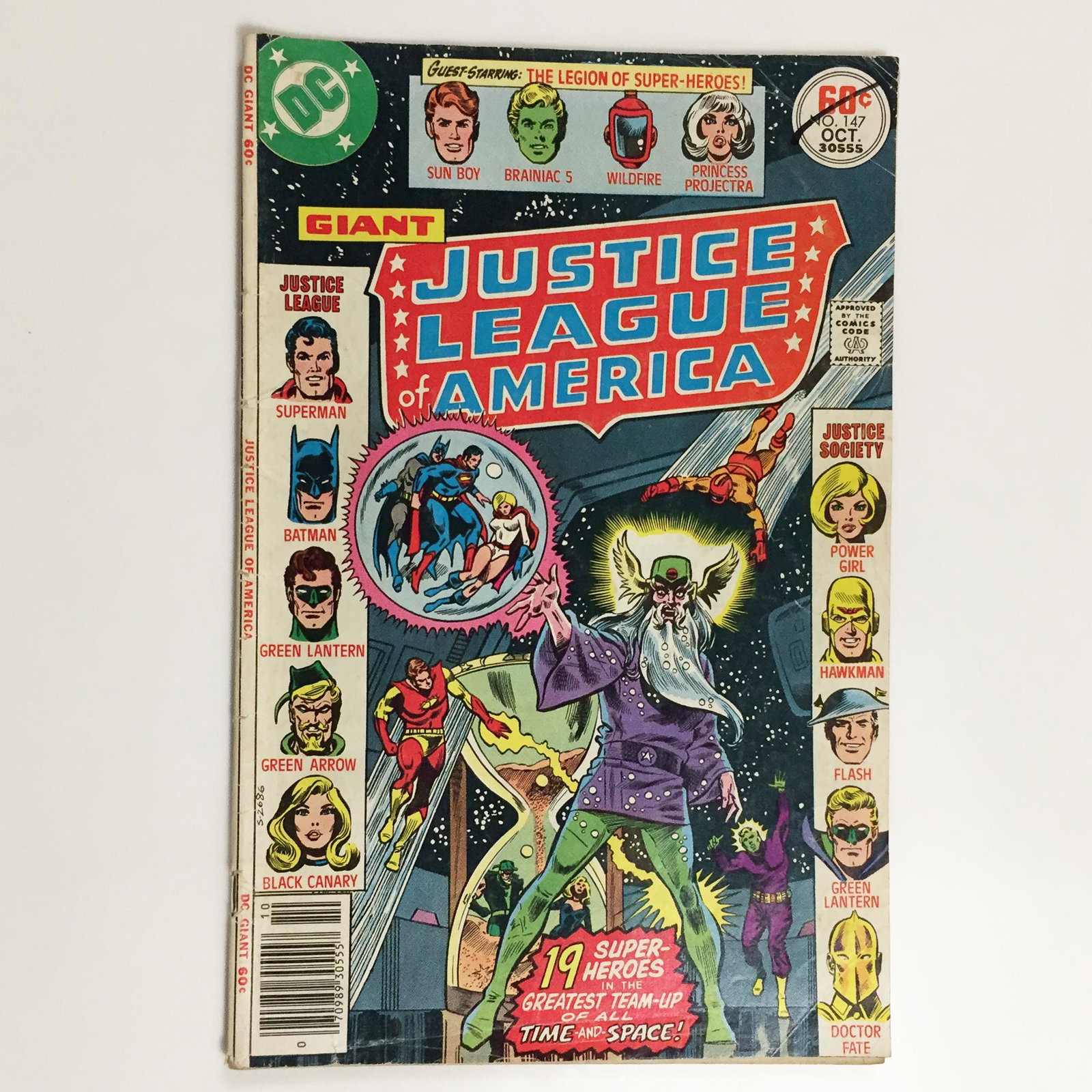 JUSTICE LEAGUE OF AMERICA #147 1977 comic book DC: Giant JUSTICE LEAGUE OF AMERICA #147 1977 Bronze Age comic book DC. Condition good to fair - signs of wear on the covers, cover is comig off at one staple. Comic book is bagged and boarded.
