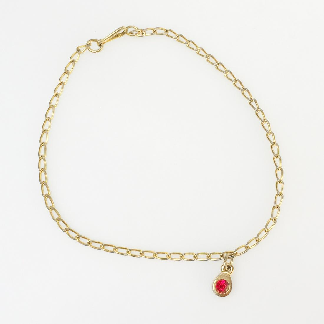 Gold tone ruby color crystal anklet, 9 1/4 inches: Gold tone ruby color crystal anklet, 9 1/4 inches. Length 9 1/4 inches. Condition very good.