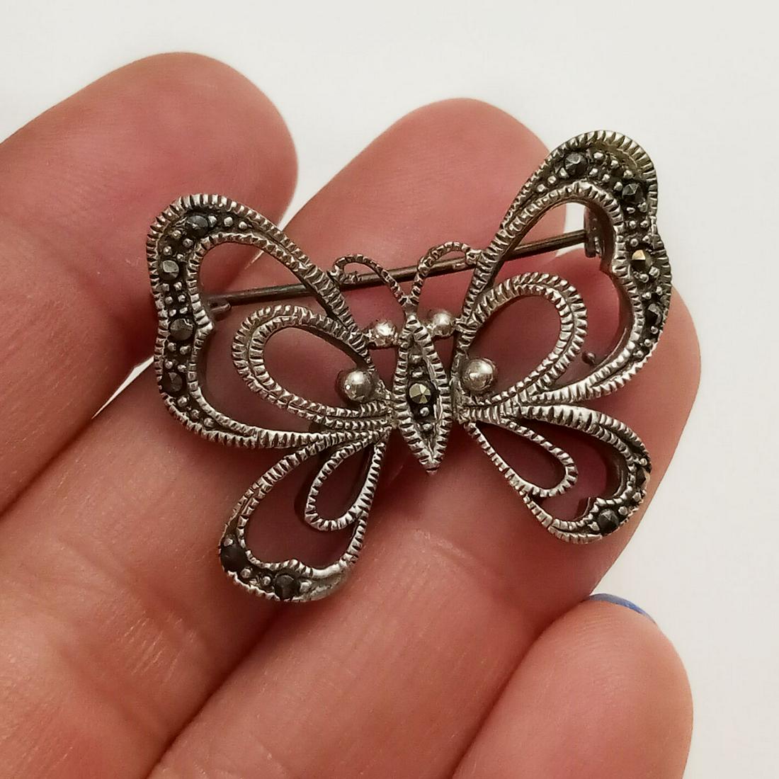 Sterling silver marcasites Butterfly brooch: Sterling silver textured finish marcasites Butterfly brooch. Weight 7.83 grams. Measured 1 1/4 x 7/8 inches. Hallmarked 925. Condition very good.