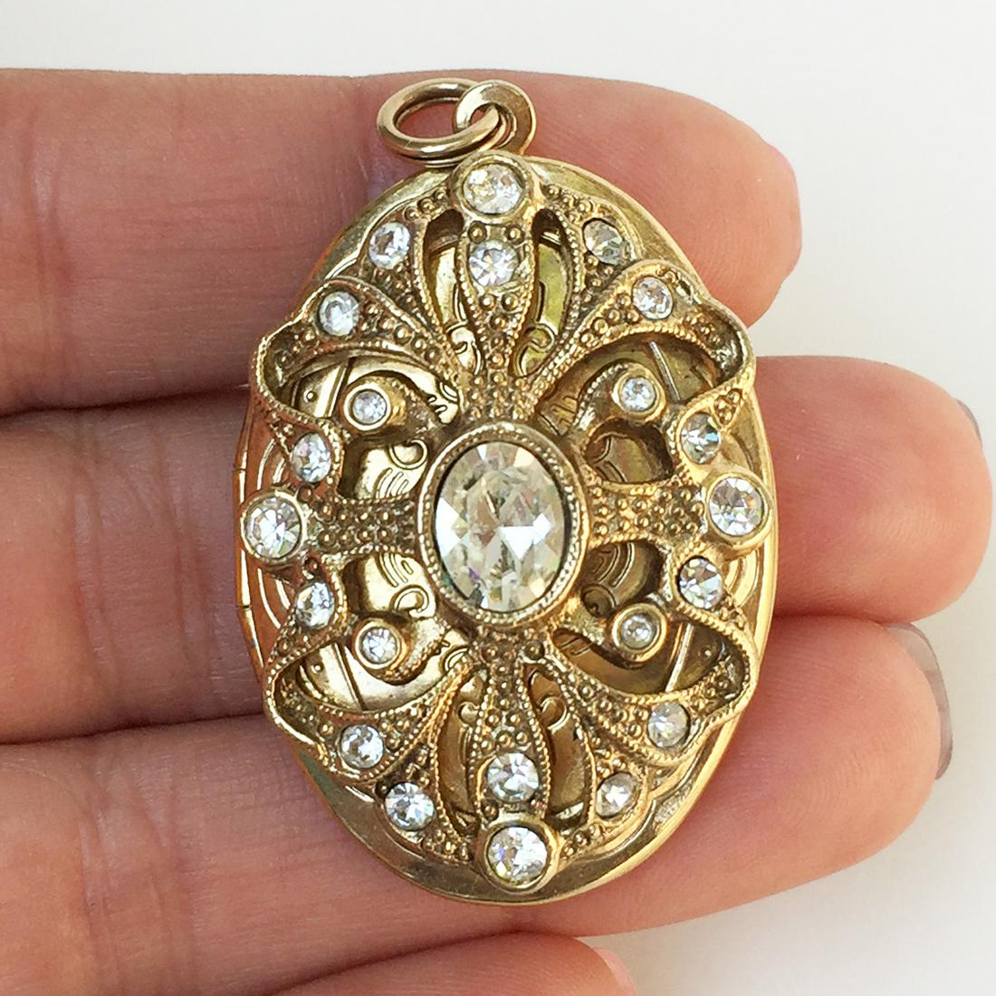 Gold tone clear crystals oval locket pendant (1 of 4)