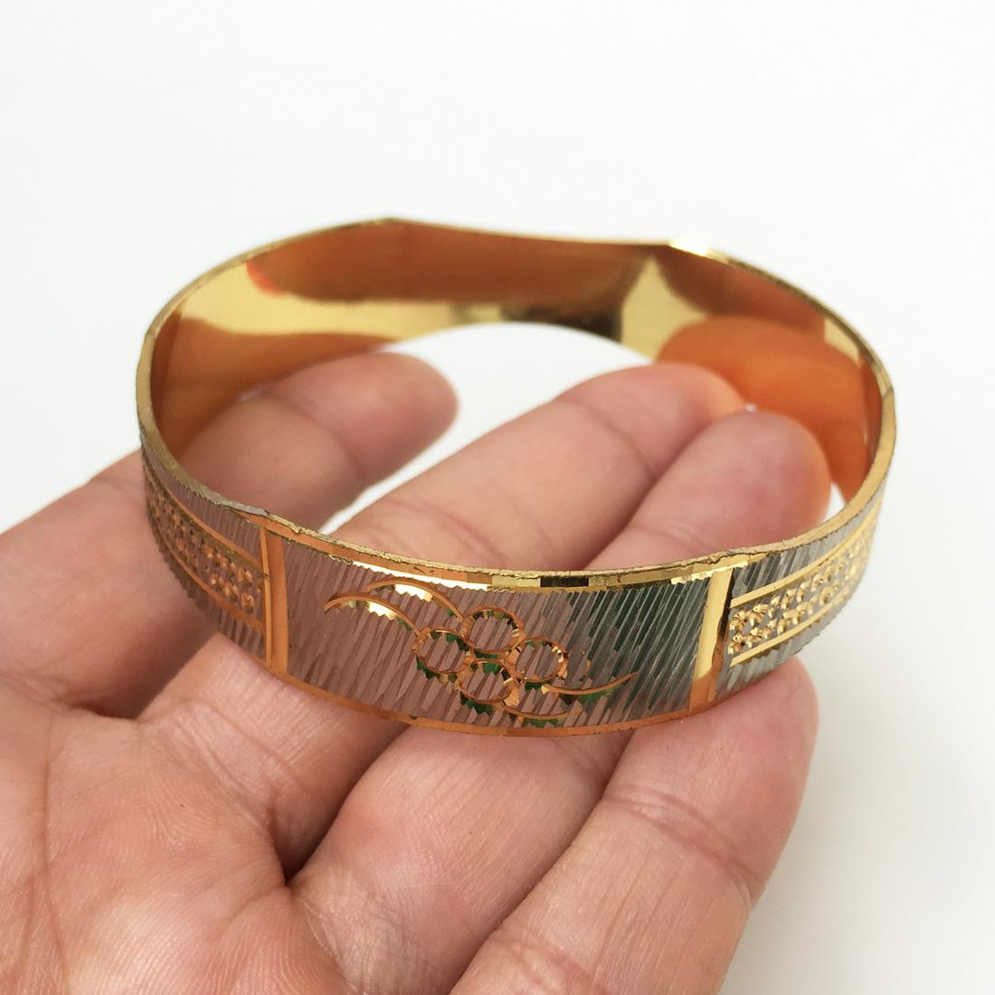 Gold and silver tone diamond cut bangle bracelet (1 of 5)