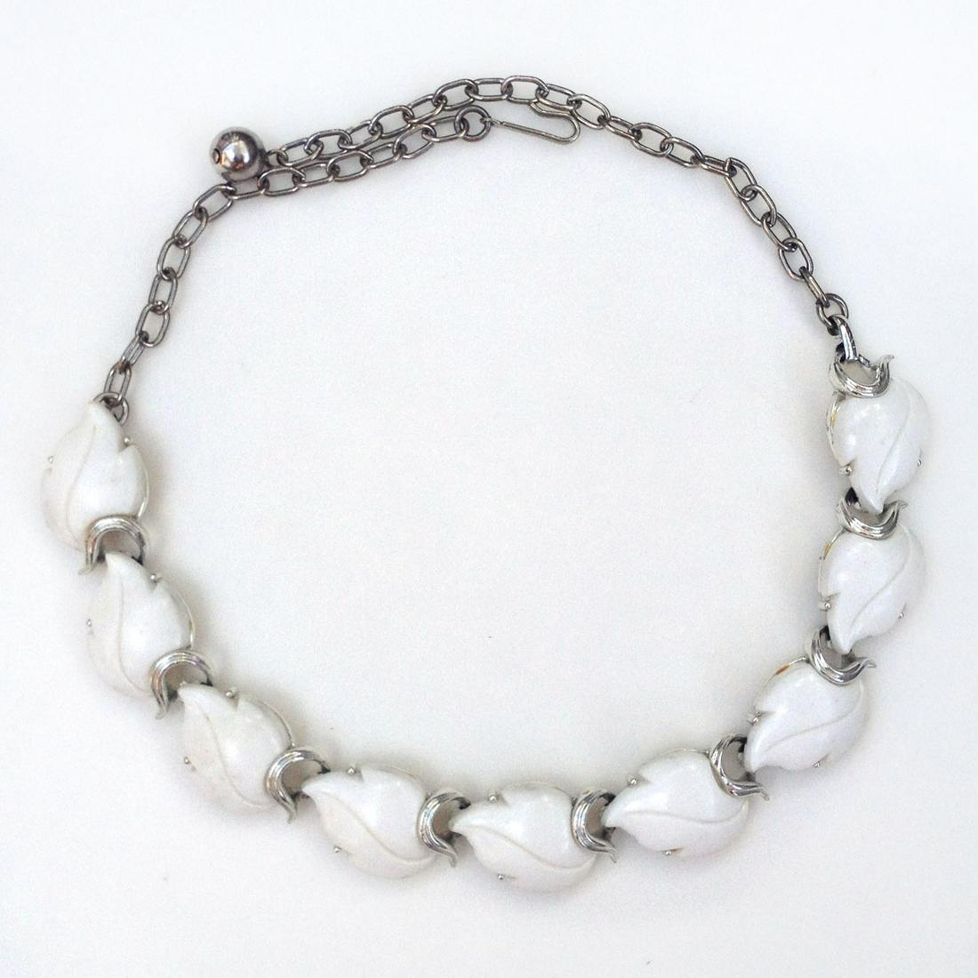 Silver tone white Leaf shape necklace: Silver tone white Leaf shape necklace. Length 16 inches. Condition very good.
