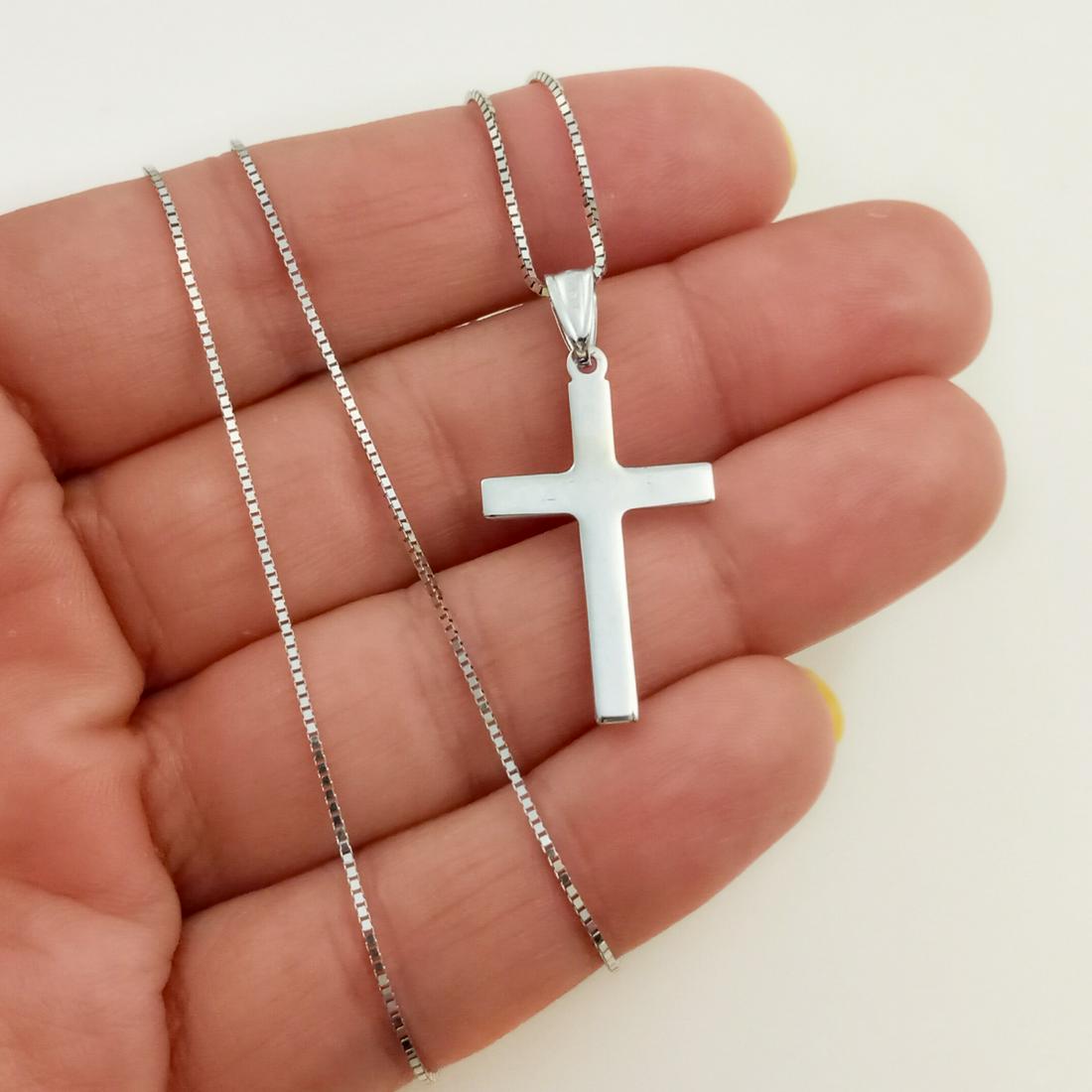 14K white gold Cross pendant and box chain necklace: 14K white gold Cross pendant and box chain necklace. Total weight 3.11 grams. Chain length 18 inches. Cross measured 1 1/4 inches with bail. Hallmarked RCI 14K, Indonesia.