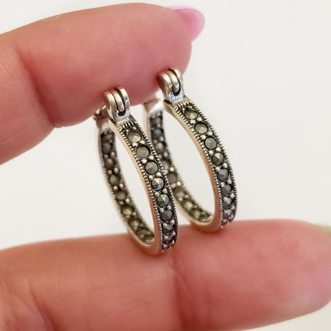 MARSALA Vintage sterling silver marcasites earrings: MARSALA Vintage sterling silver marcasites hoop earrings, signed. Weight 5.05 grams. Length 7/8 inches. Hallmarked 925 M and reversed C. Condition very good.