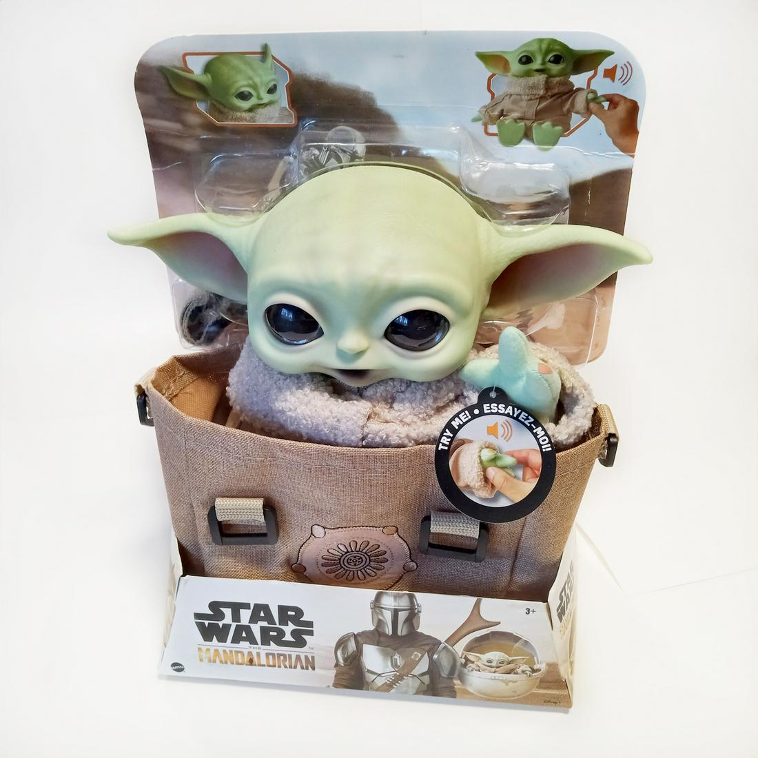 STAR WARS Disney Mandolorian Grogu the child toy: STAR WARS Disney Mandolorian Grogu the child toy. The child is a plush toy with plastic head, comes with a carry bag. The Child length 11 inches. Toy makes sounds when pressed on the left hand. The ch