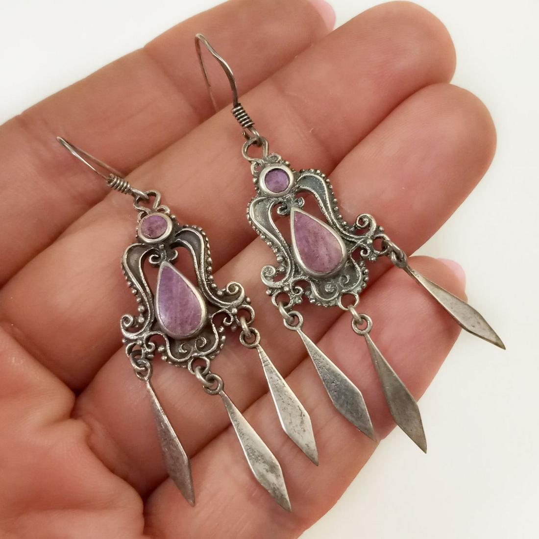 Vintage sterling silver purple enamel earrings: Vintage sterling silver purple enamel inlay chandelier fish hook earrings. Weight 6.0 grams. Length 2 inches. Hallmarked 925. Condition very good.