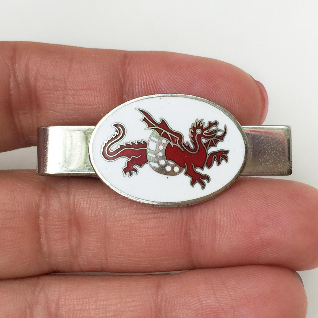 ROBBINS CO Silver tone white red enamel Dragon tie clip: ROBBINS CO ATTLEBORO silver tone white red enamel Dragon tie bar clip. Length 1 3/4 inches. Condition very good.