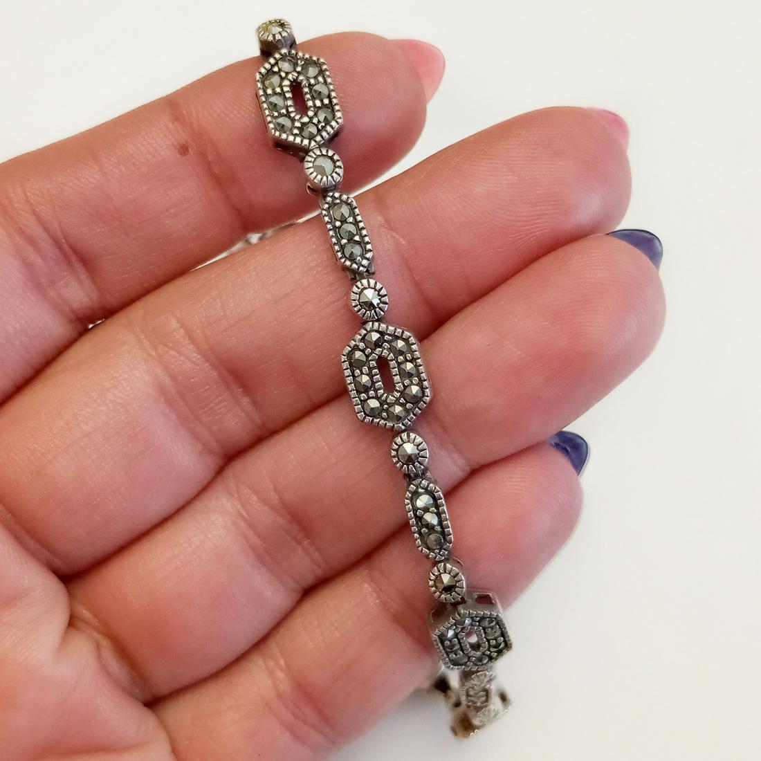 Vintage sterling silver marcasites geometric bracelet: Vintage sterling silver marcasites geometric bracelet. Weight 15.60 grams. Length 7 1/2 inches. Hallmarked ATI 925. Conditio very good.