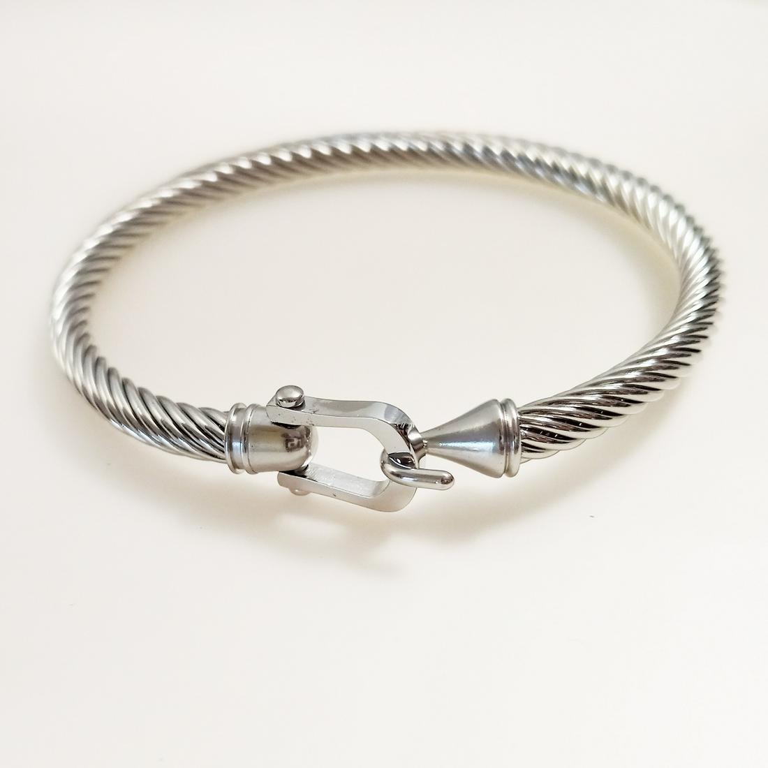 Silver tone twisted cable texture buckle bracelet (1 of 5)