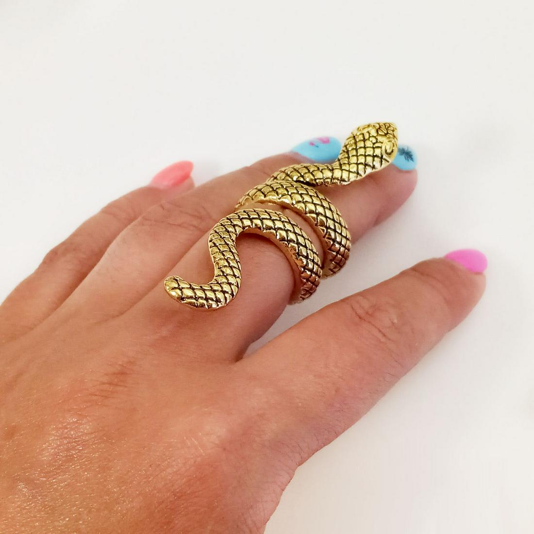 Gold tone textured finish blacken details Snake ring, 7: Gold tone textured finish blacken details Snake ring, size 7. Snake measured 2 1/2 inches in length. Condition excellent.