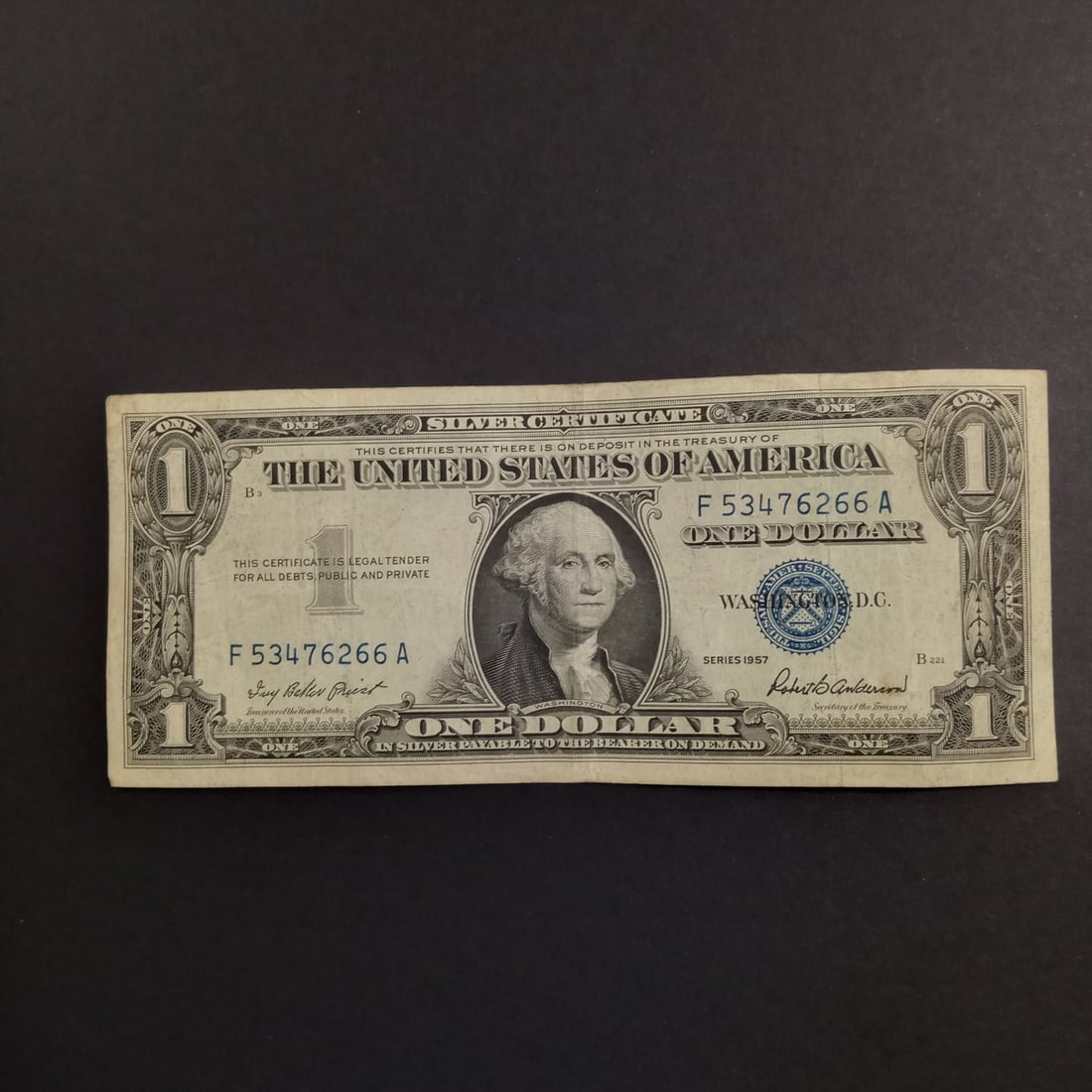 Collectible 1957 US $1 One dollar silver certificate bill blue seal (1 of 2)