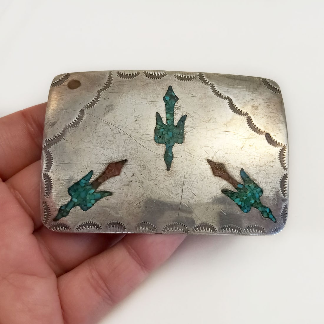 Silver plated crushed turquoise Bird design belt buckle: Silver plated crushed turquoise inlay Bird design rectangular belt buckle. Measured 2 3/4 x 2 inches. Condition good.