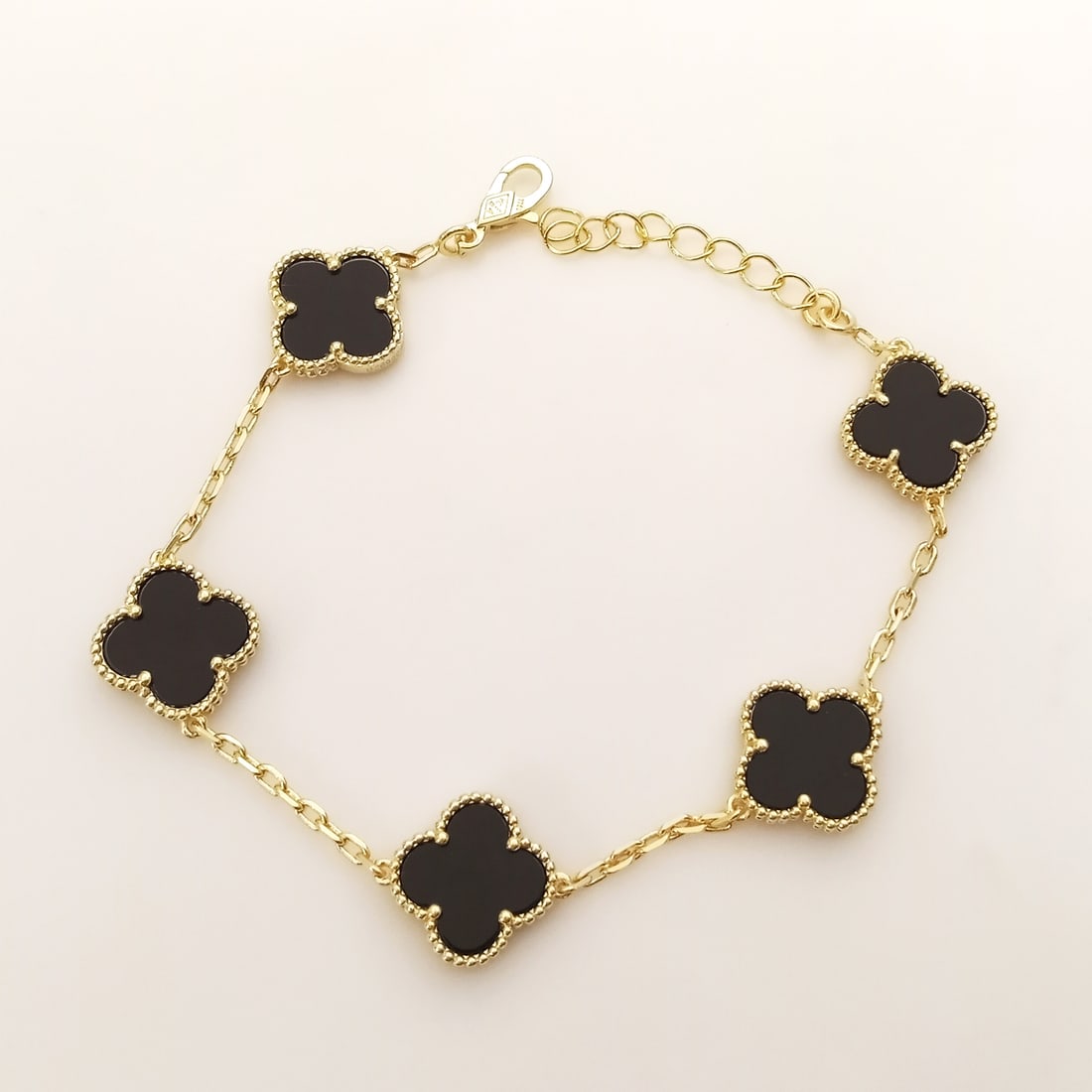 Gold tone stainless steel black 4 Leaf Clover Flowers bracelet (1 of 4)