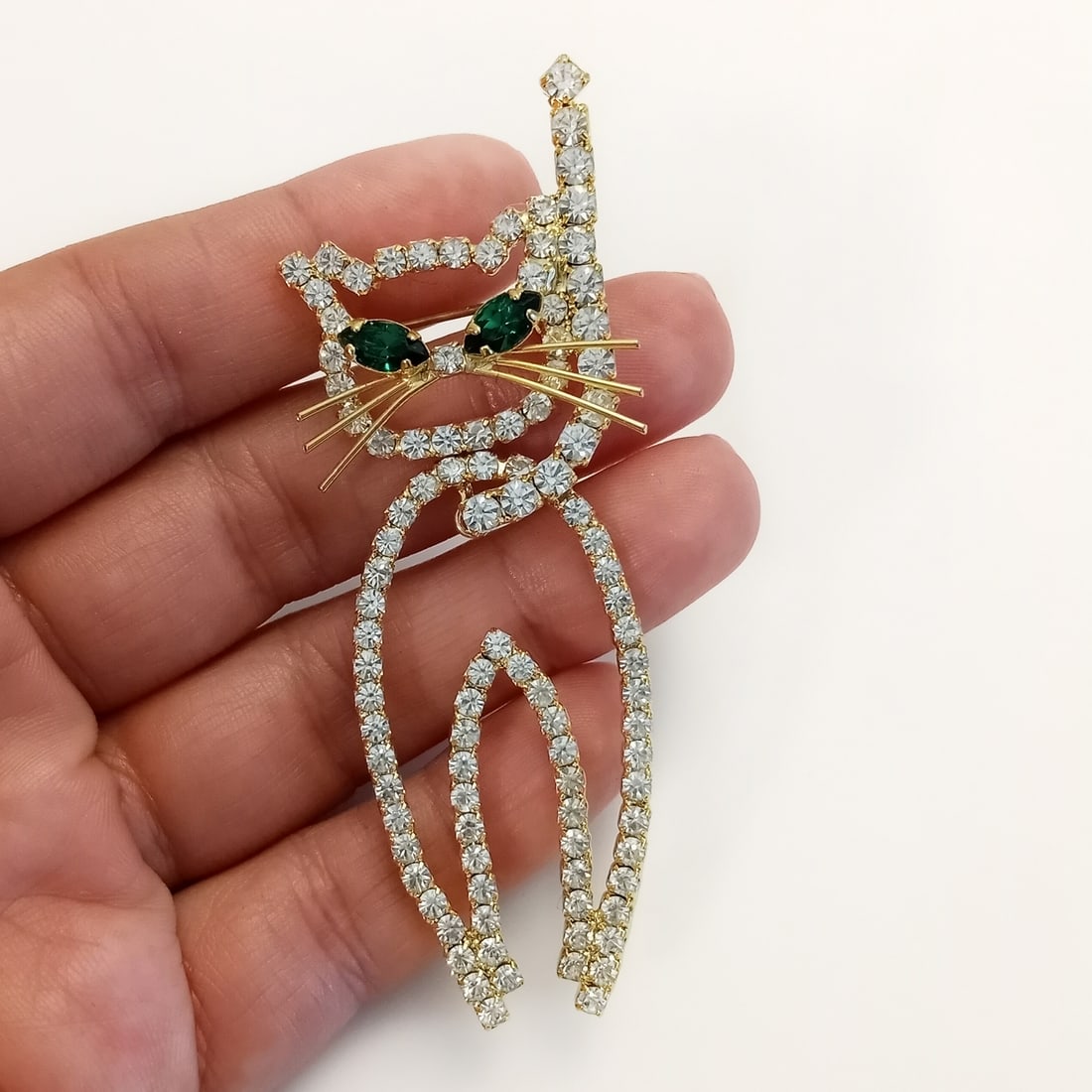 Vintage gold tone clear and green rhinestones dangling Kitty Cat brooch (1 of 4)