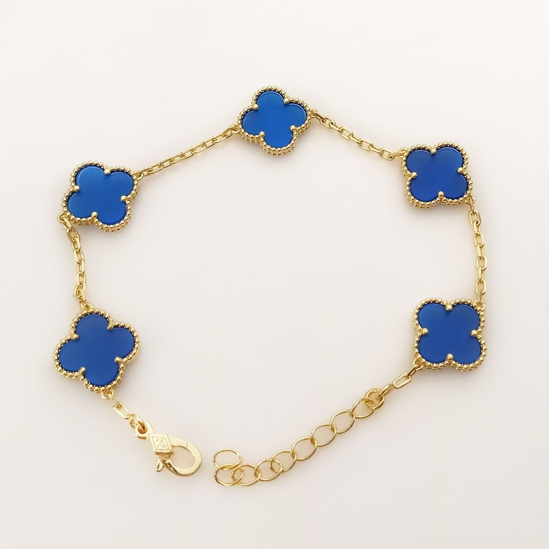 Gold tone stainless steel blue 4 Leaf Clover Flowers bracelet (1 of 4)