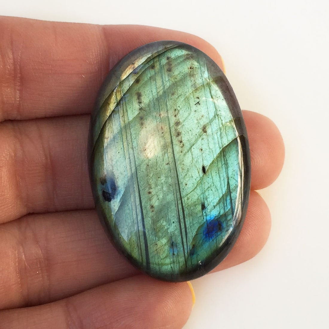 Oval shape labradorite cabochon, weight 70.84 cts (1 of 6)