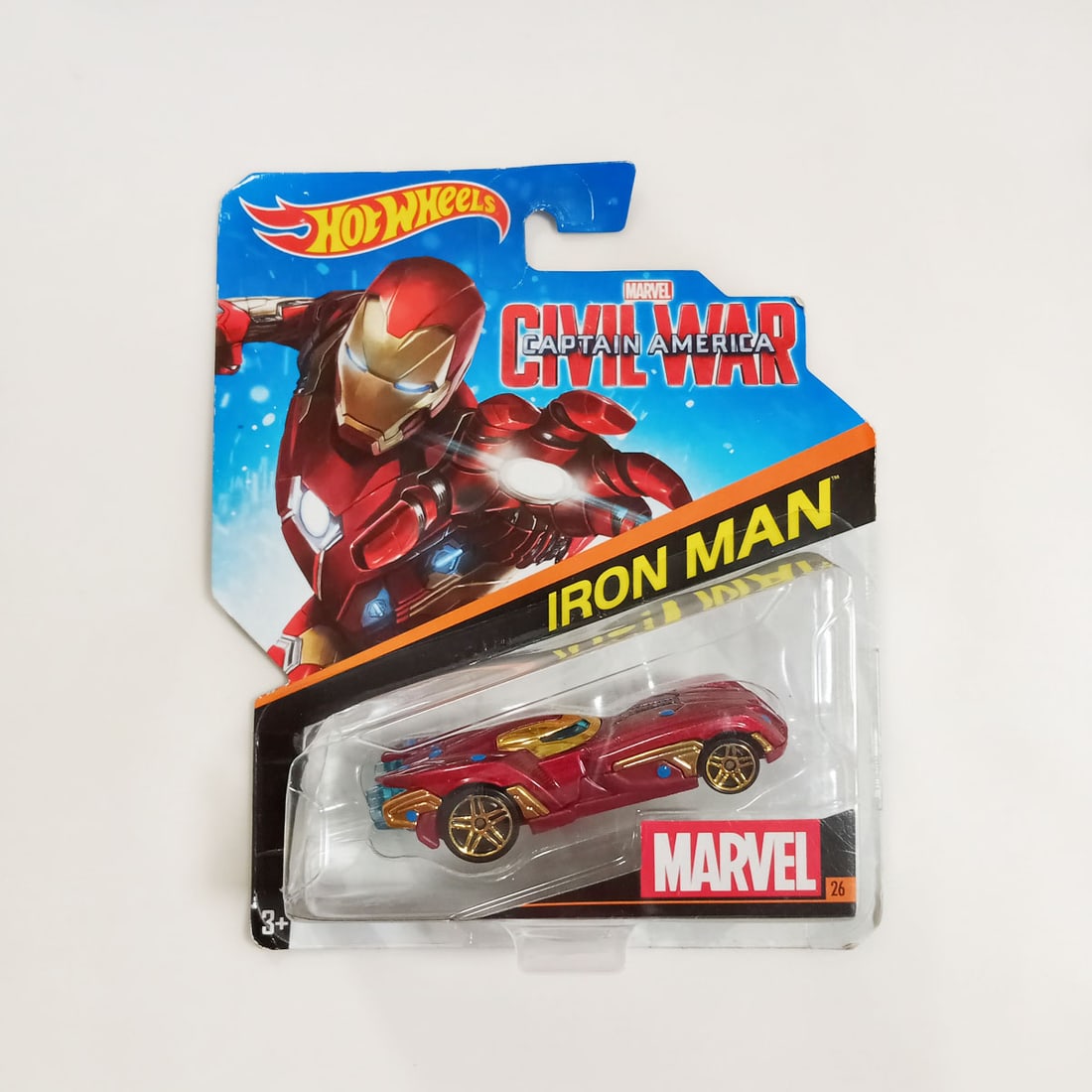 HOT WHEELS #26 Civil War Captain America Iron man car: HOT WHEELS #26 Civil War Captain America Iron man car. In the box, never opened. Box has slight signs of wear due to storage.