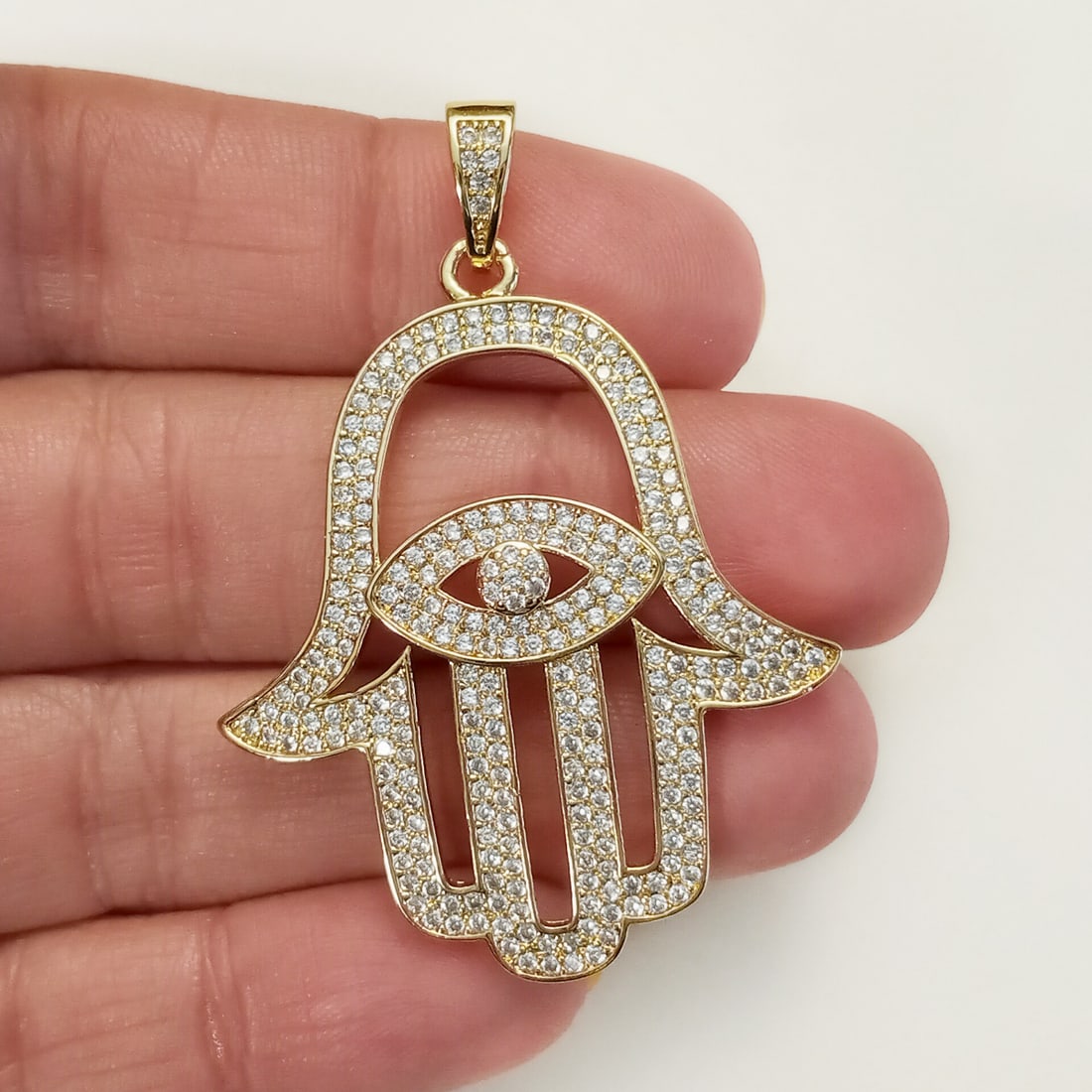 Gold tone pave set clear CZ Hamsa shape pendant (1 of 3)
