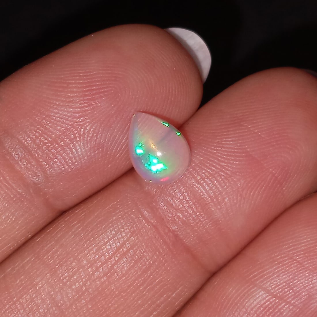 Pear shape Opal cabochon, weight 0.88 cts (1 of 3)