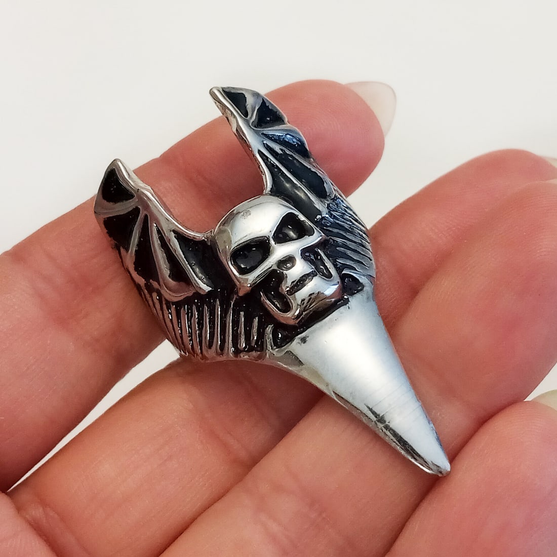 Silver tone Skull Bat wing ring, size 10 3/4: Silver tone blacken detail Skull Bat wing ring, size 10 3/4. Top measured 1 3/4 x 1 inches. Condition very good.