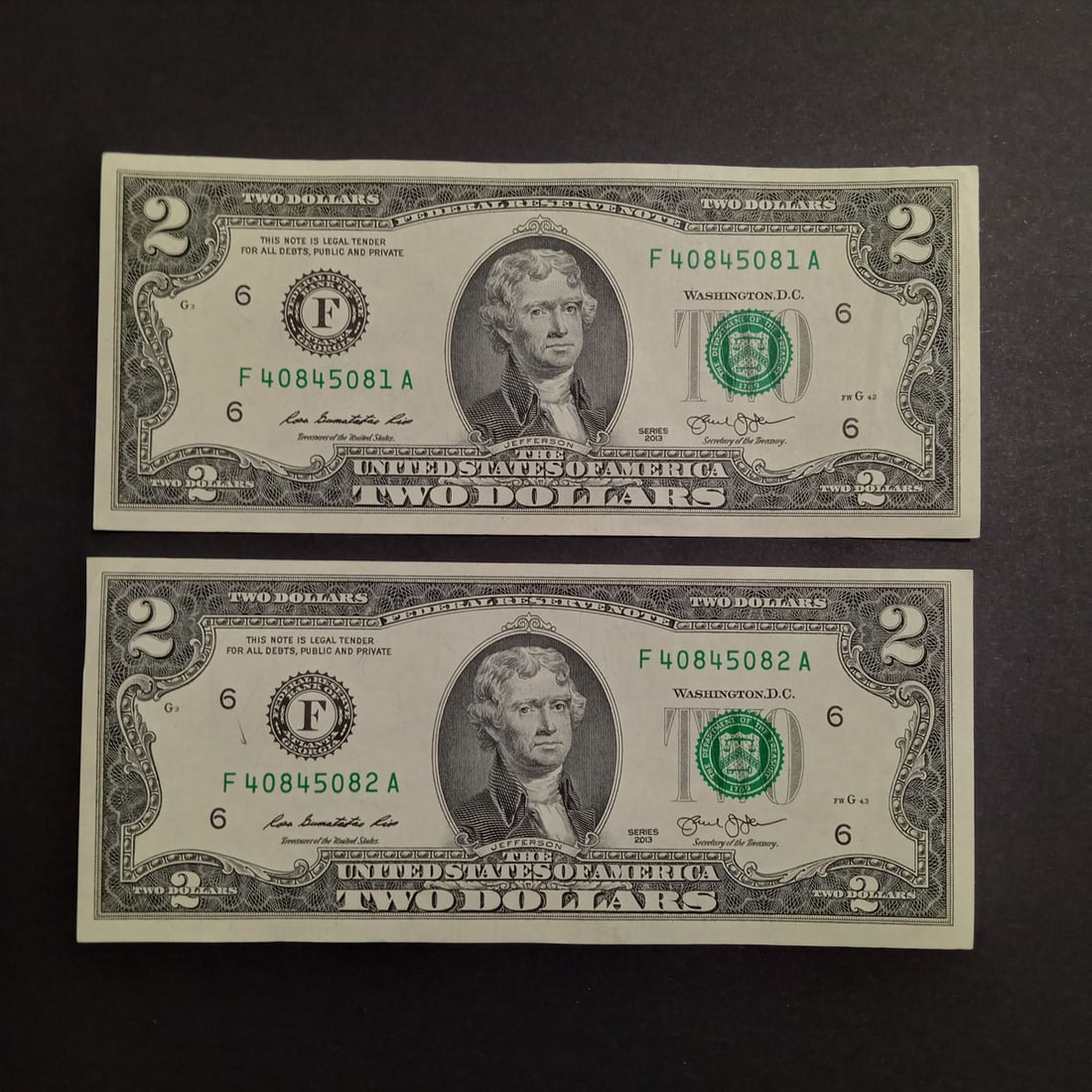 2 2013 US $2 dollar consecutive serial numbers bills (1 of 2)