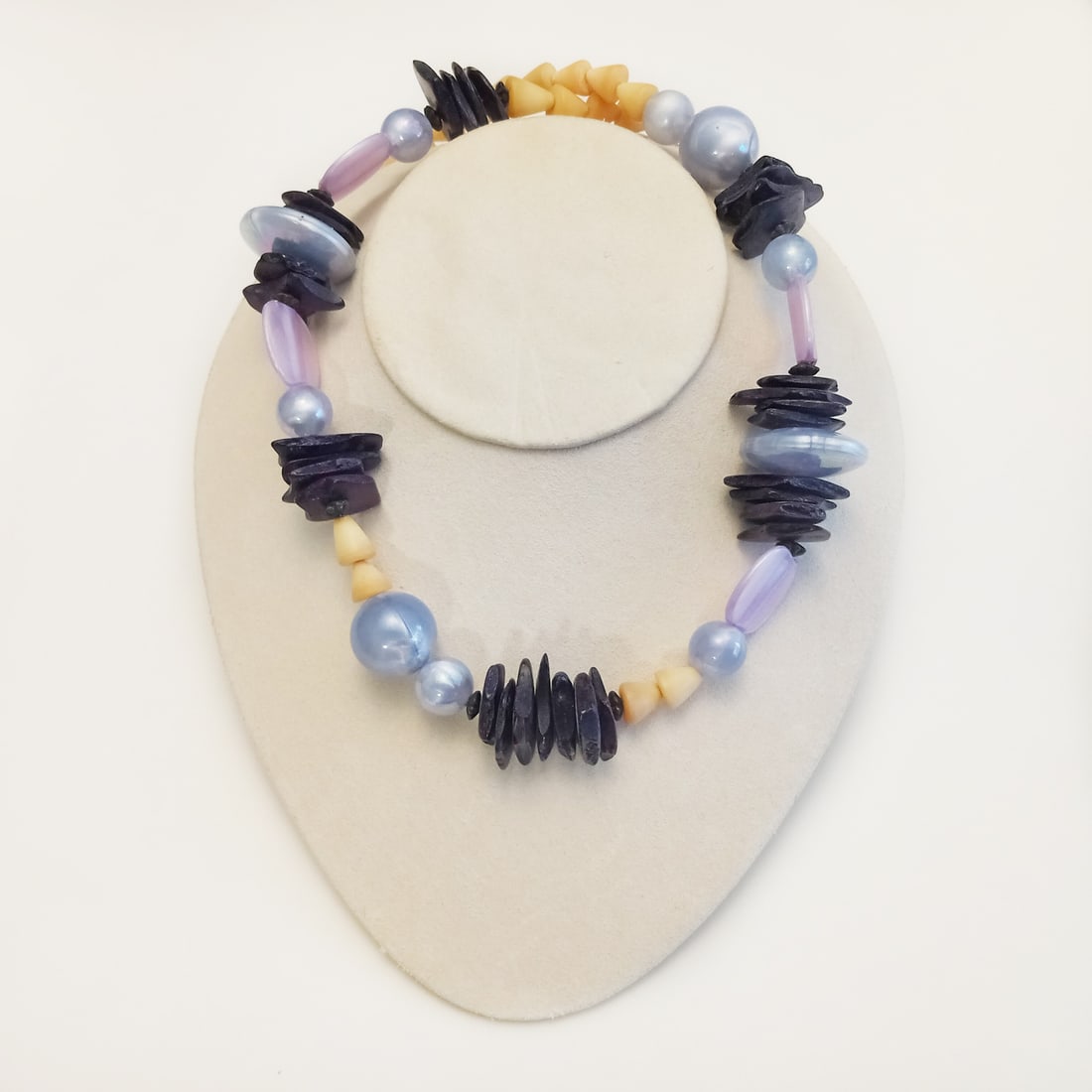 Vintage pink purple lavender and ivory color necklace: Vintage pink purple iridescent lavender and ivory color necklace. Length 24 inches. Condition very good.