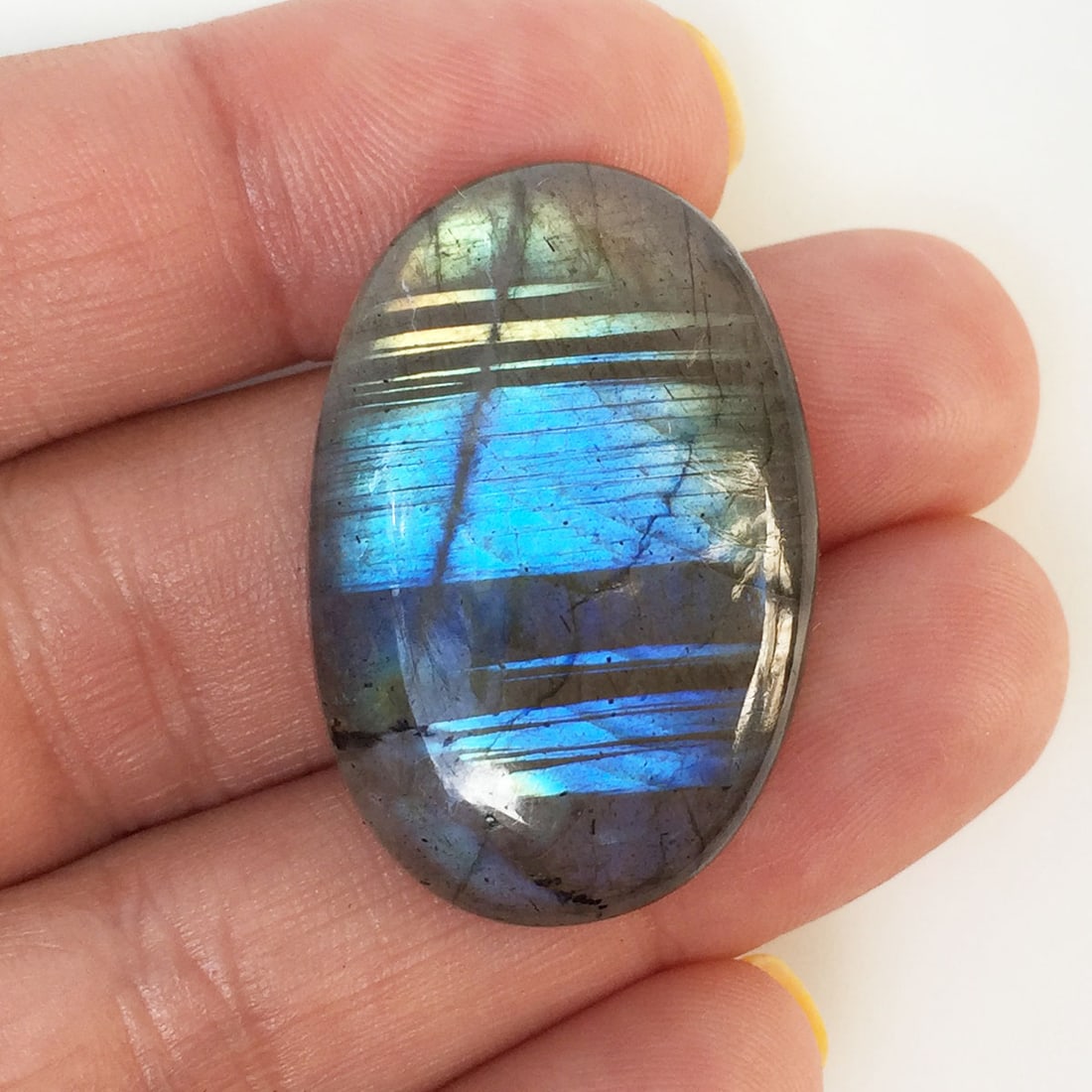 Oval shape labradorite cabochon, weight 48.04 cts (1 of 4)