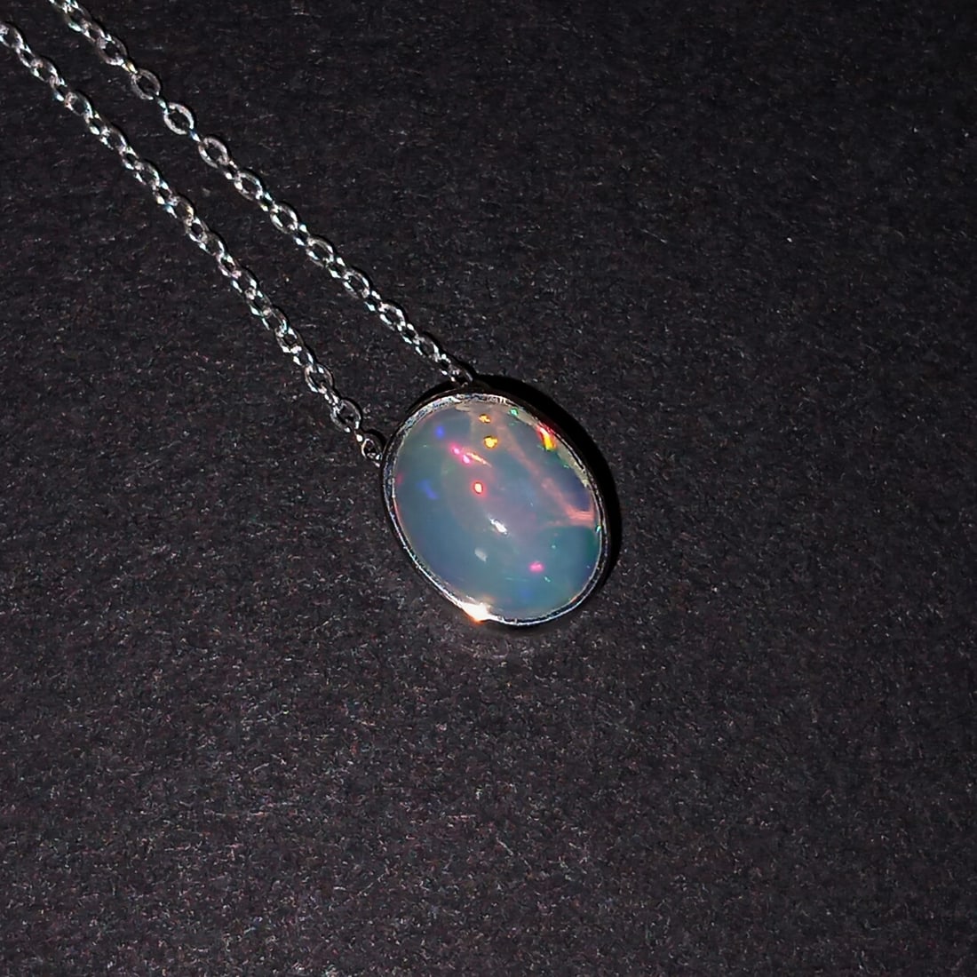 Sterling silver oval shape Ethiopian opal cabochon sliding pendant and chain necklace (1 of 5)