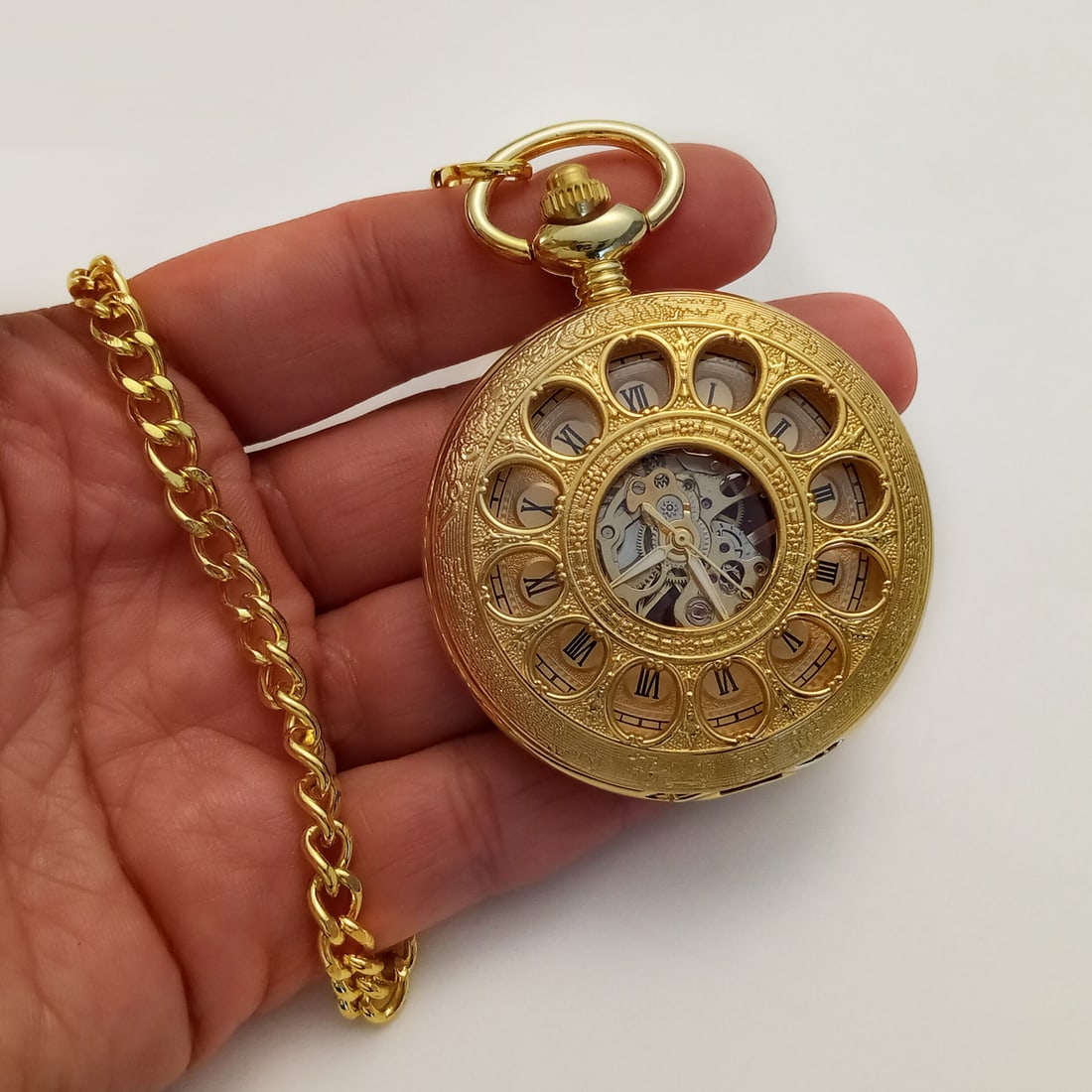 Gold tone antique style skeleton wind up pocket watch with chain (1 of 5)