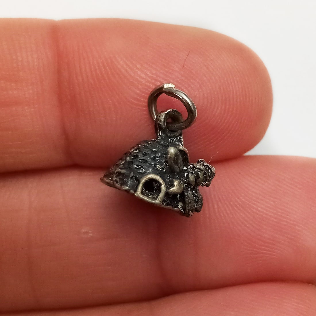 Vintage sterling silver Bee Hive charm: Vintage sterling silver Bee Hive charm. Weight 1.41 grams. Length 1/2 inches with bail. No hallmark, tested 925 sterling silver. Condition very good.