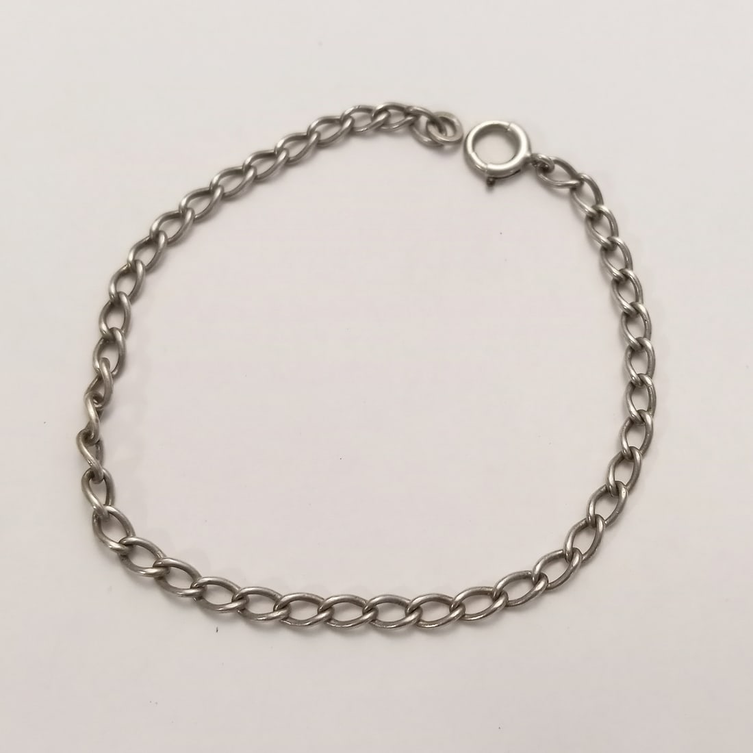 Vintage sterling silver chain bracelet for charms, length 7 1/4 inches: Vintage sterling silver chain bracelet for charms, length 7 1/4 inches. Weight 3.67 grams. Hallmarked sterling. Condition very good.