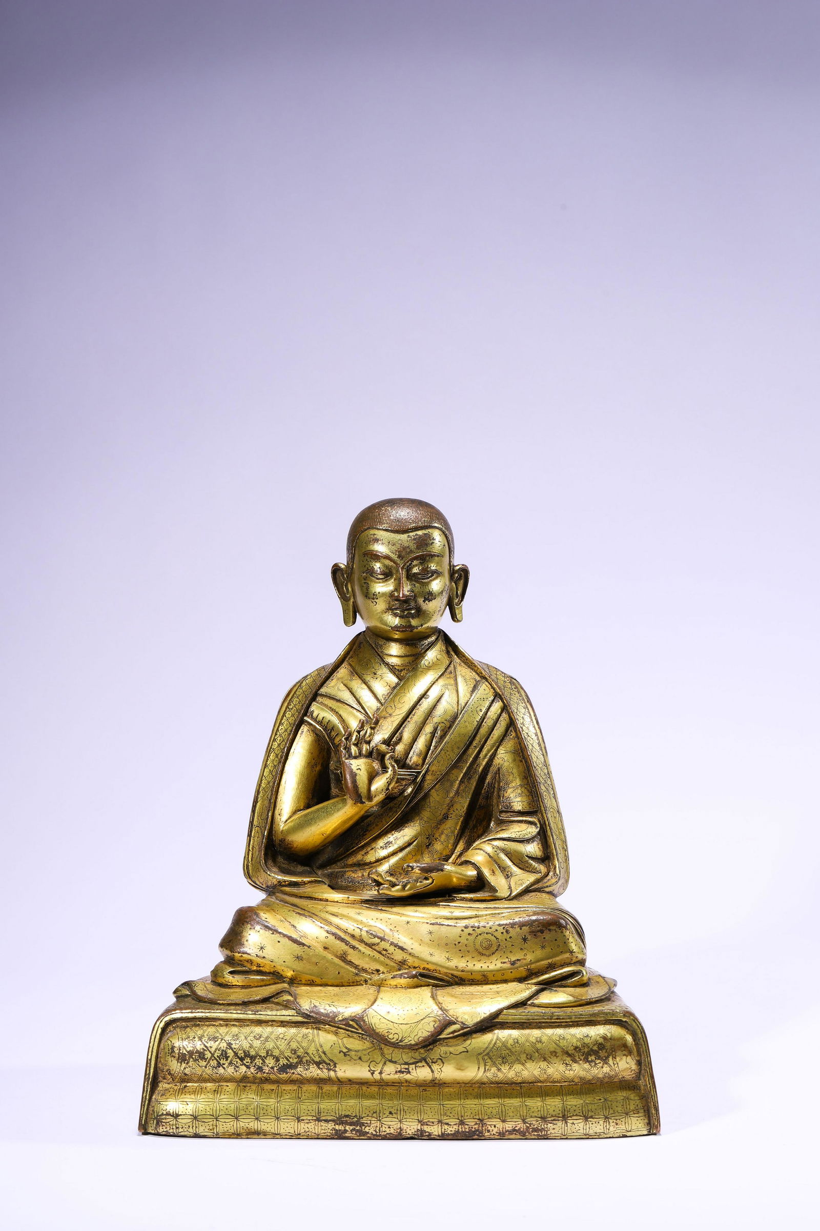 A Sino-Tibet Gilt Bronze Figure of a Monk (1 of 3)