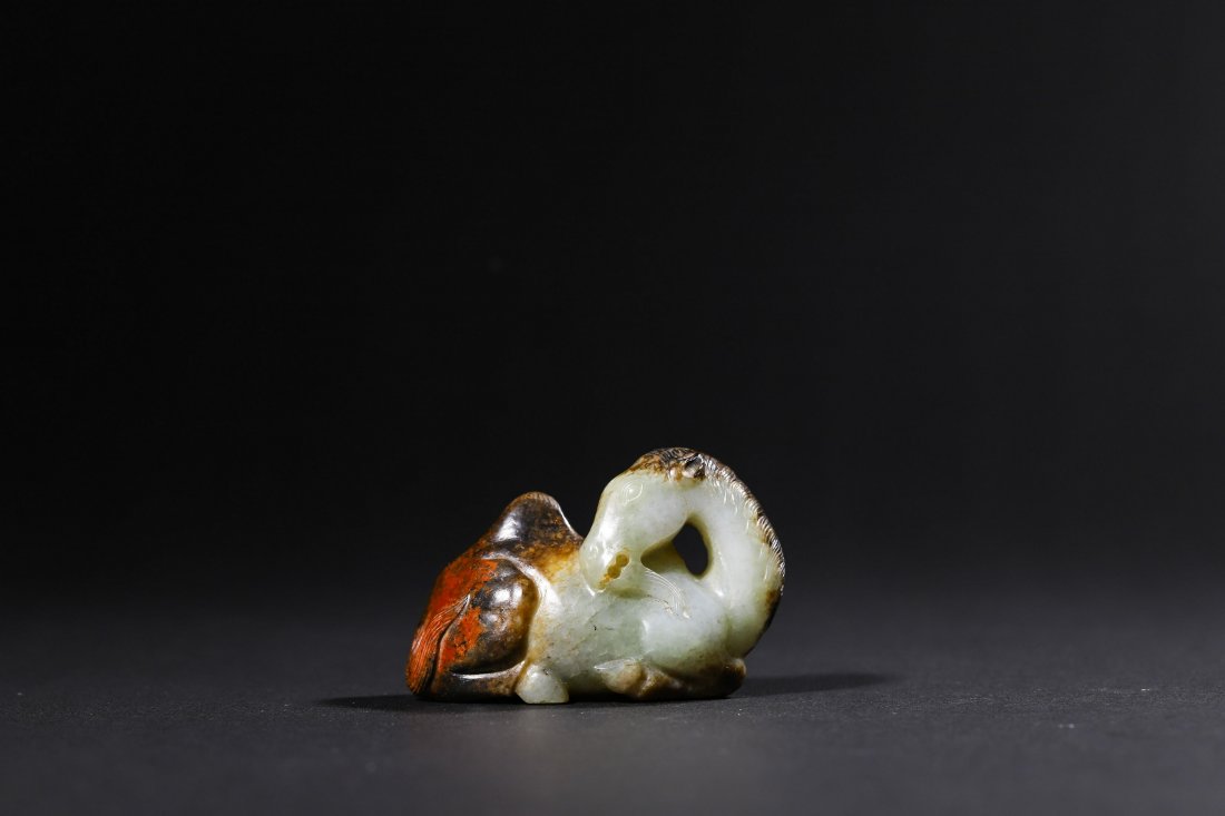 A CARVED JADE CAMEL MING DYNASTY OR LATER (1 of 3)