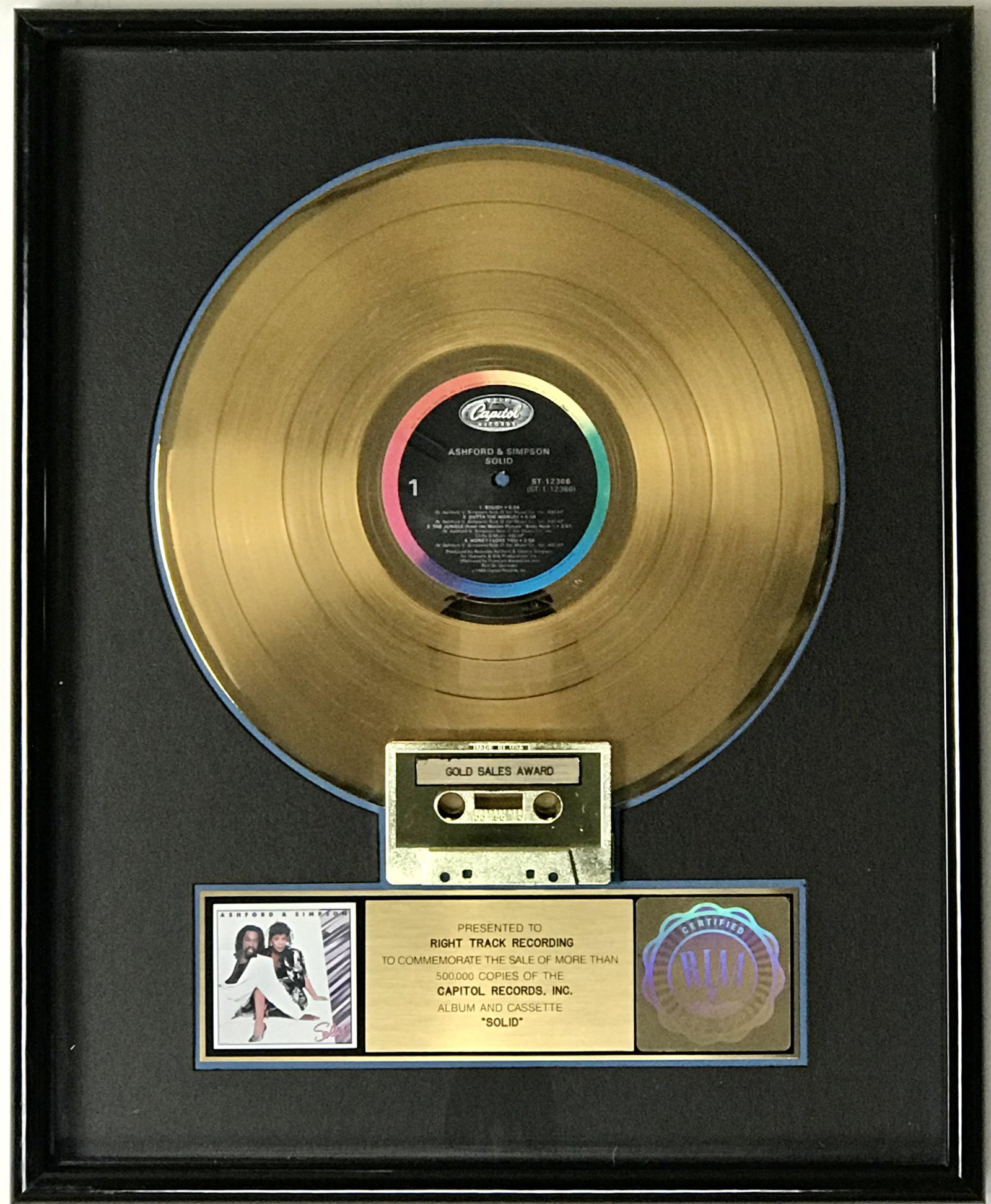 Ashford & Simpson Solid RIAA Gold LP Award: RIAA Gold LP award for Ashford & Simpson's album Solid. Released in 1984, the album was certified Gold on March 7, 1985 for 500,000 copies sold. In addition to the songwriting and performing d