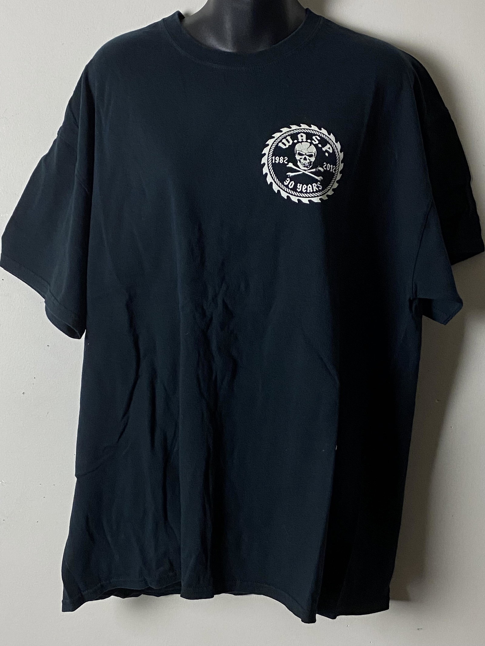 W.A.S.P. 30 Years 1982-2012 T-Shirt: Amazing W.A.S.P. 30 Years 1982-2012 t-shirt! The W.A.S.P. logo and is emblazoned on the upper front of the shirt and the back has "W.A.S.P. Crew. The shirt is a lightweight in navy blue. There is a ta