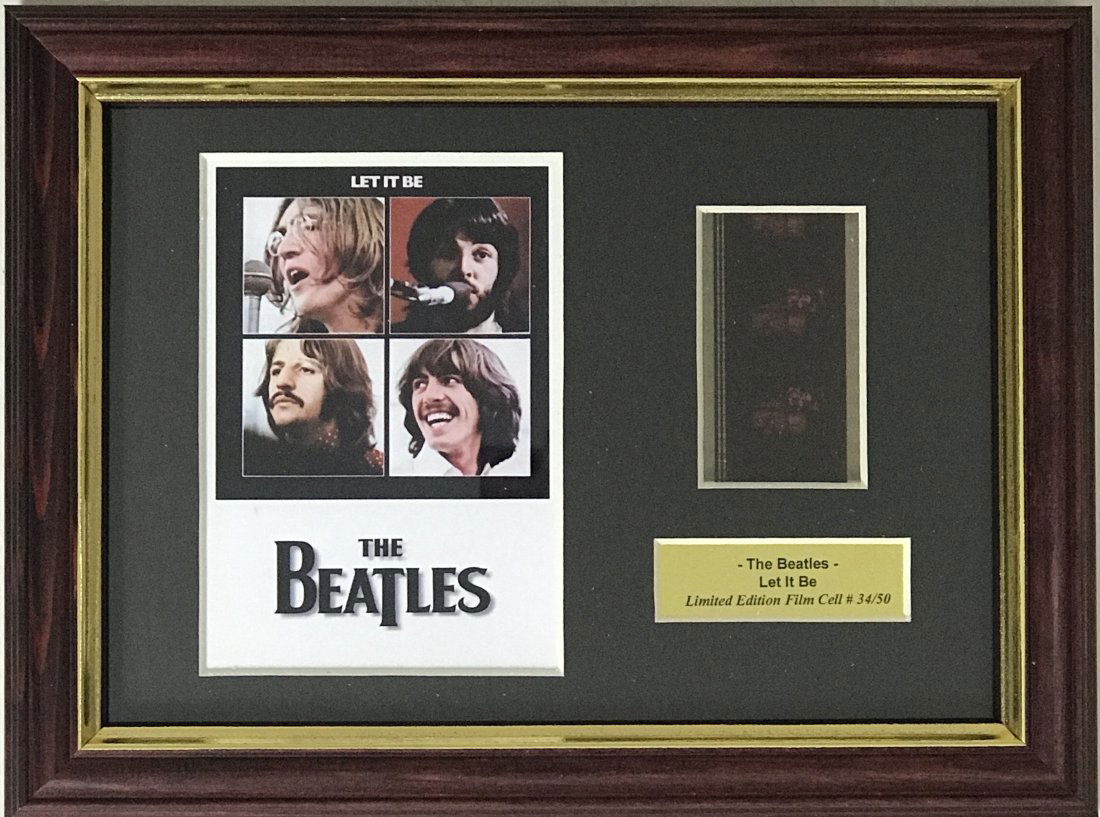 Beatles "Let It Be" Film Cel Collage: Unique piece! Beatles Let It Be genuine film cel, framed in a small collage. Featuring iconic image from the film. Framed in a special open-design floater frame with a clear back and front, this small
