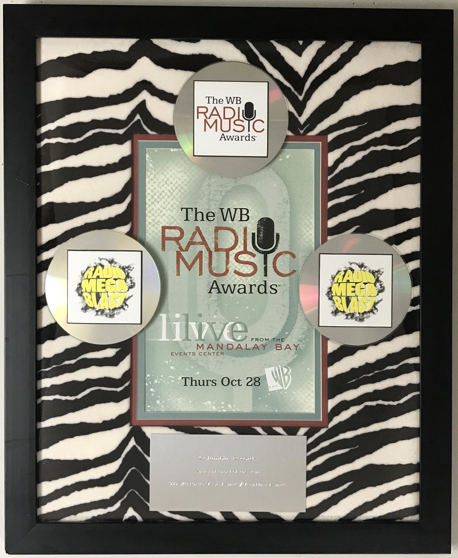 WB Radio Awards Columbia Records Award: Columbia Records 1999 "Label Of The Year" award from the WB Radio/Megablast Awards. This record industry award recognized Columbia Records for their successes with artists such as Aerosmith, Bob Dylan