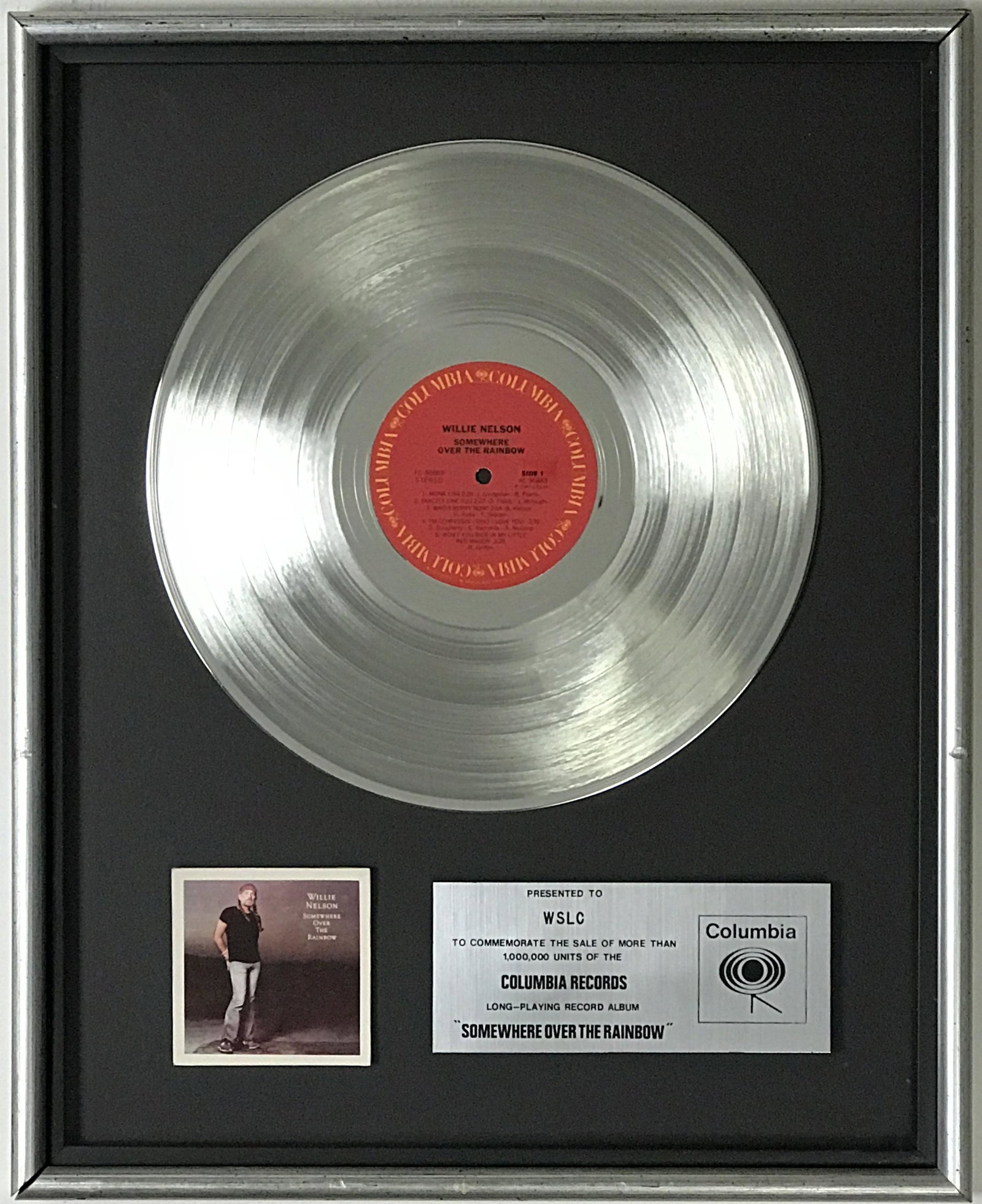 Willie Nelson Somewhere Over The Rainbow label award: Columbia Records label award recognizing 1,000,000 sales of Willie Nelson's Somewhere Over The Rainbow album. Released in 1981, the album went to #1 on the Billboard Top Country A