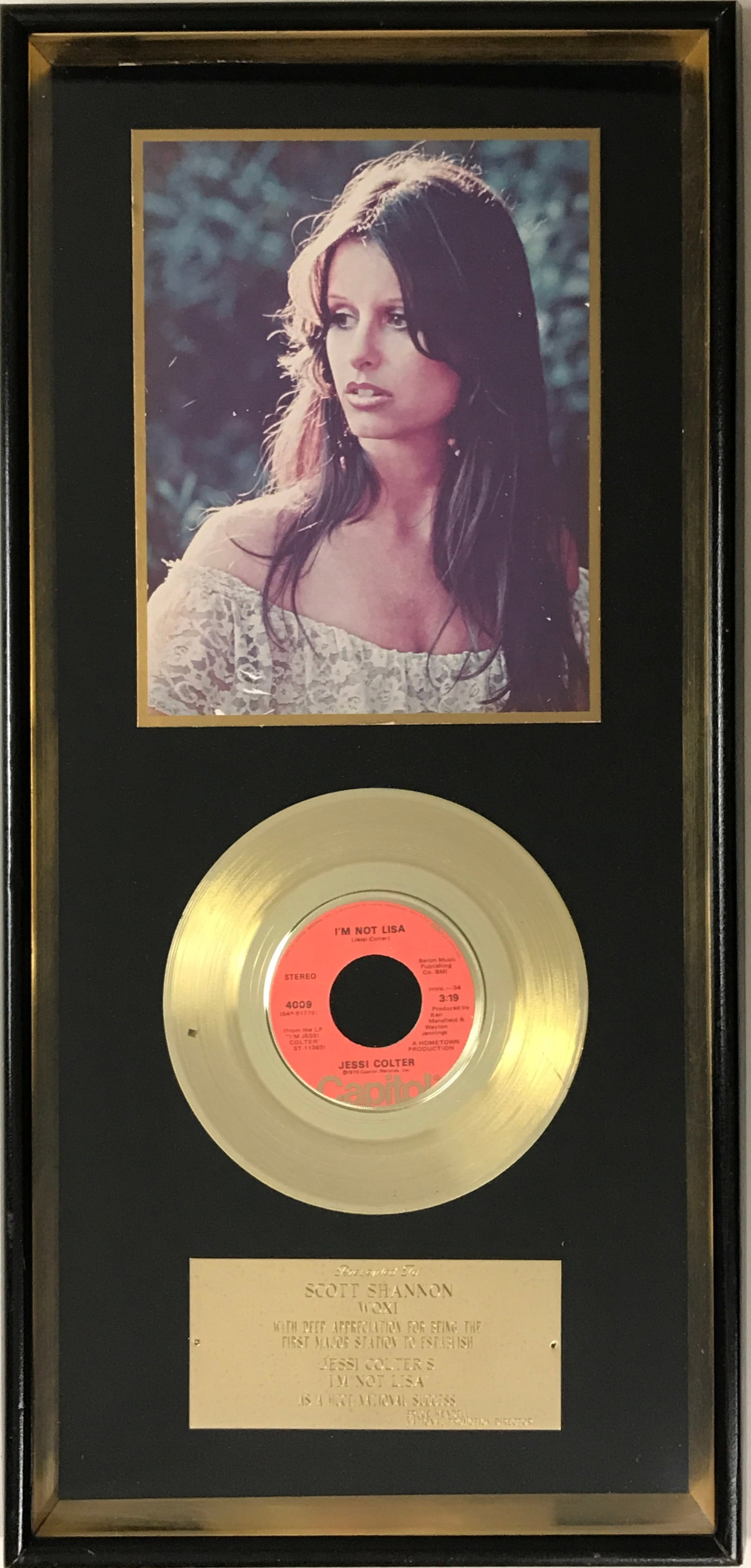 Jessi Colter "I'm Not Lisa" 1975 Capitol Records Award: Capitol Records award for Jessi Colter hit "I'm Not Lisa", which was released in 1975. Written by Colter and produced by her husband Waylon Jennings, the track reached #4 on the Billboard Hot 100 char