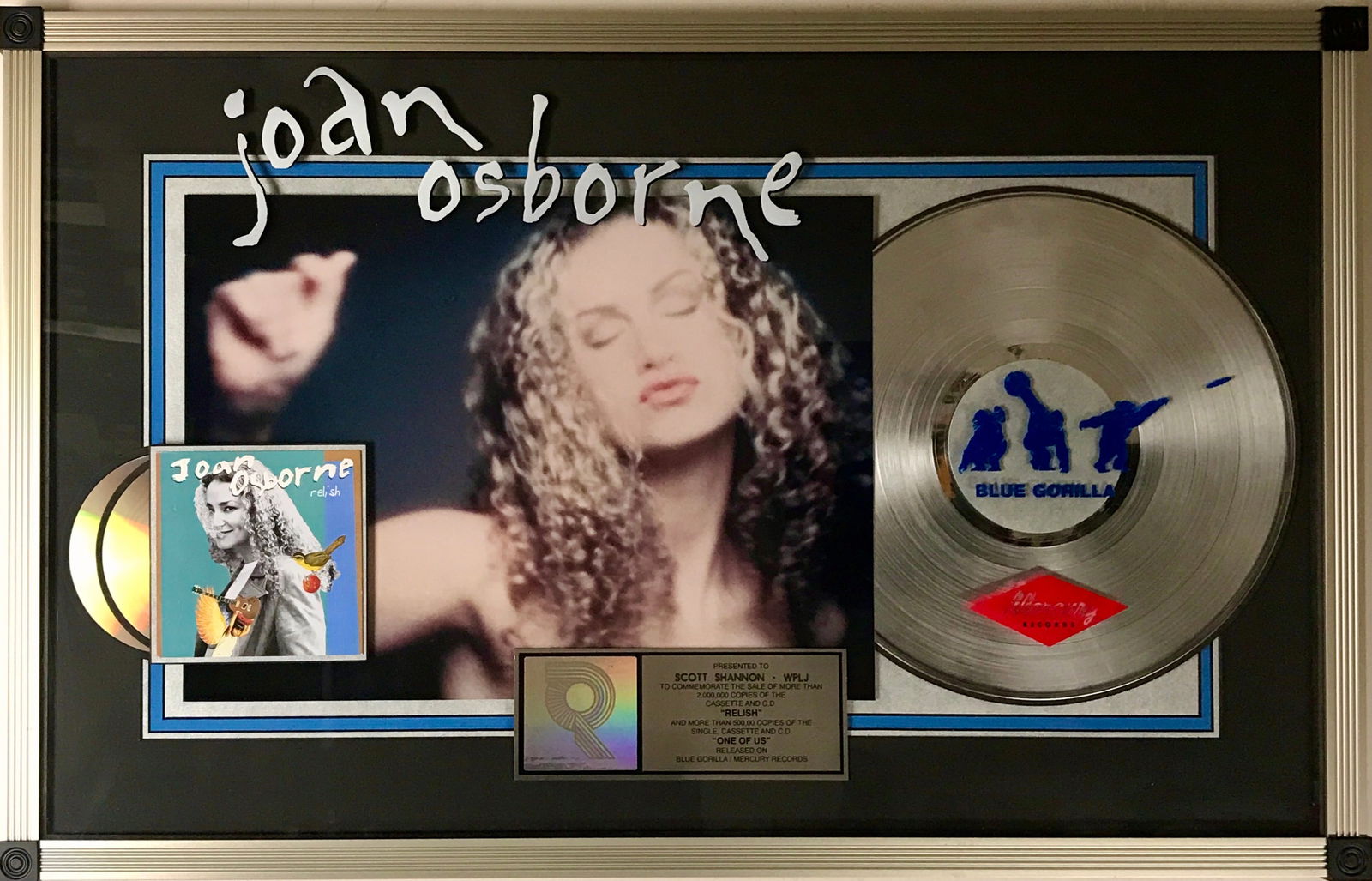 Joan Osborne "One Of Us" RIAA 2x Platinum Award: RIAA 2x Multi-Platinum Album and Gold single award for "One Of Us" and Relish, the debut album from Joan Osborne. Released on Mar. 21, 1995, the album was certified 2x Multi-Platinum by the RIAA on Ma