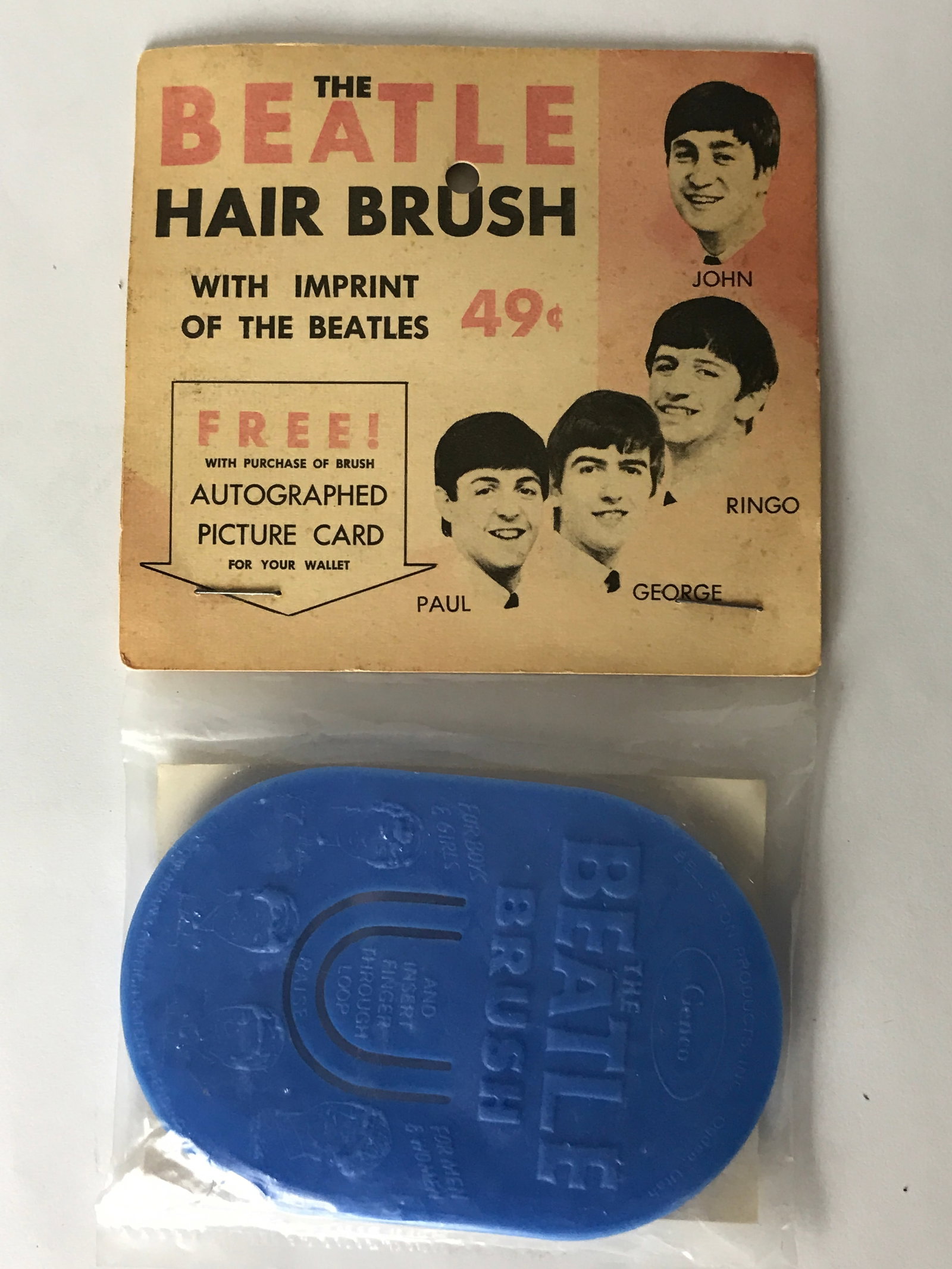 Beatles Brush Blue Genco 1964 Sealed Original: Beatles Brush by Genco in sealed bag with cardboard top - original. In Excellent unused condition sealed in original packaging. Made in the U.S.A by Genco. 1964. Blue brush. Features: Original Beatles