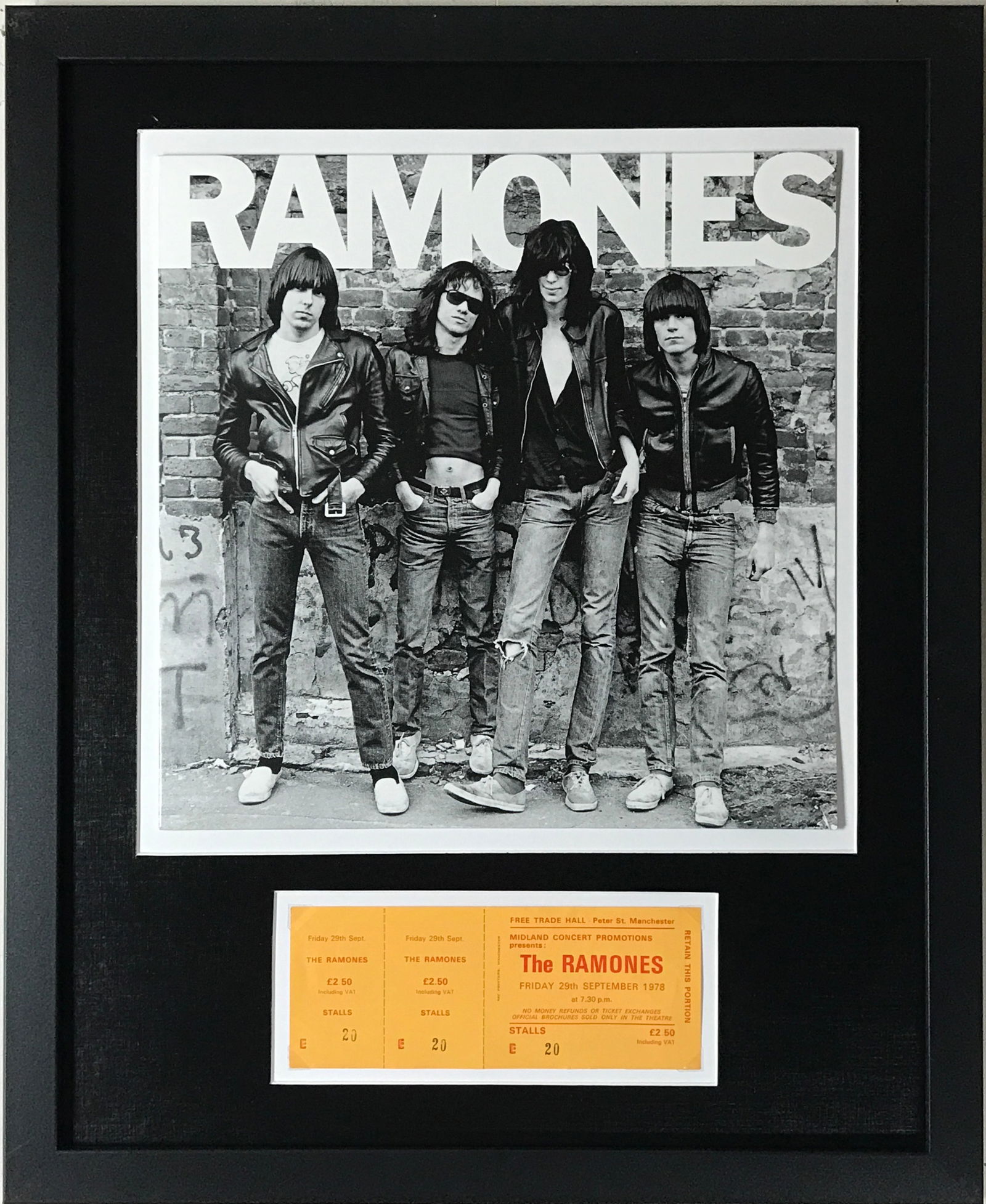 Ramones Genuine 1978 Ticket Collage: Framed Ramones collectible piece contains an unused Sept. 29, 1978 Manchester UK concert ticket, from the group's peak period. Also features a Ramones album jacket in the collage. Custom matted and fr