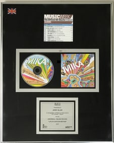 MIKA Life In Cartoon Motion BPI Platinum Album Award