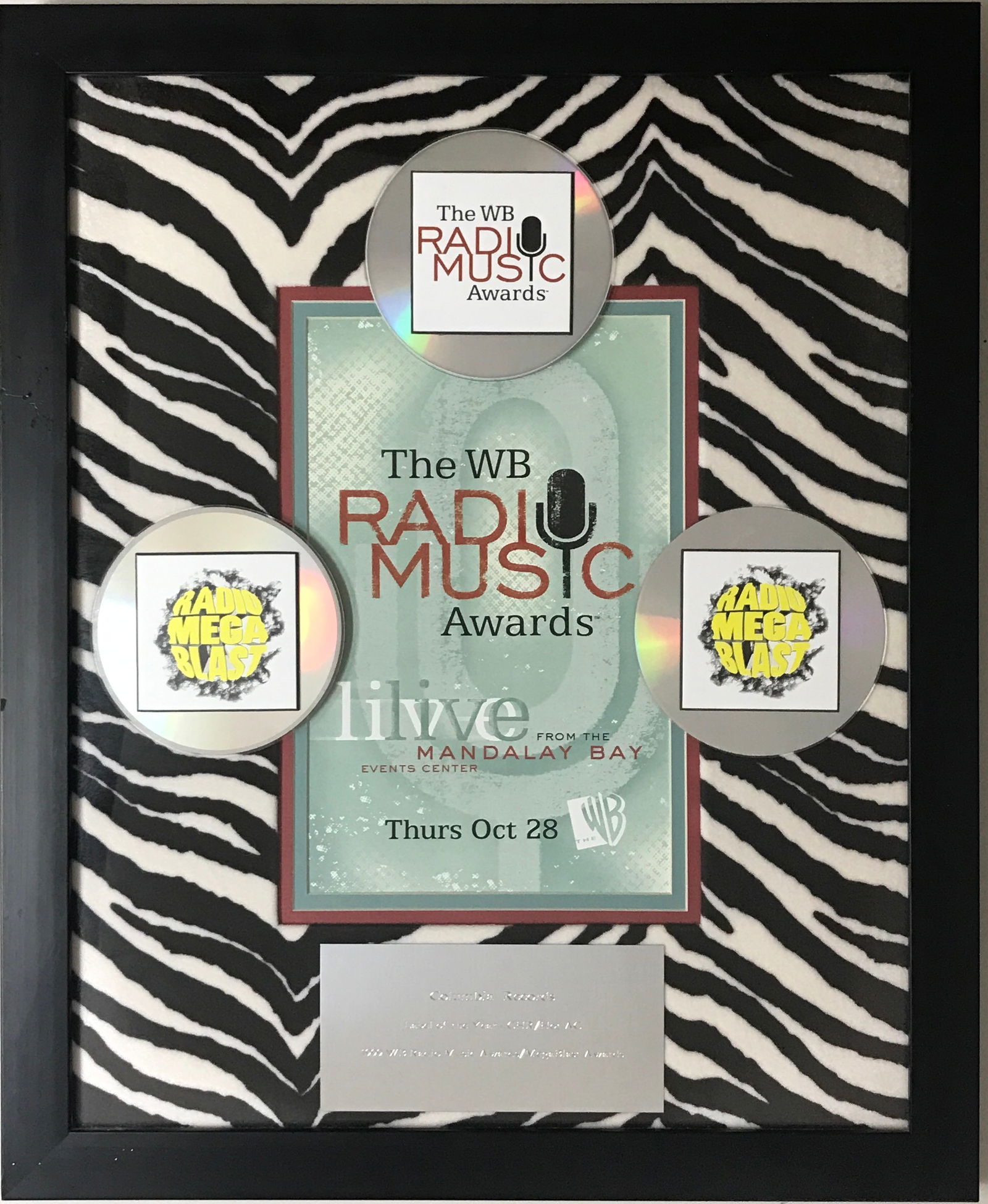 WB 1999 Radio Awards Columbia Records Award: Columbia Records 1999 "Label Of The Year" award from the WB Radio Awards. This record industry award recognized Columbia Records for their successes with artists such as Aerosmith, Bob Dylan, Billy Jo