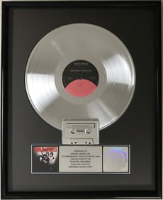 Georgia Satellites debut RIAA Platinum LP Award presented to group's drummer