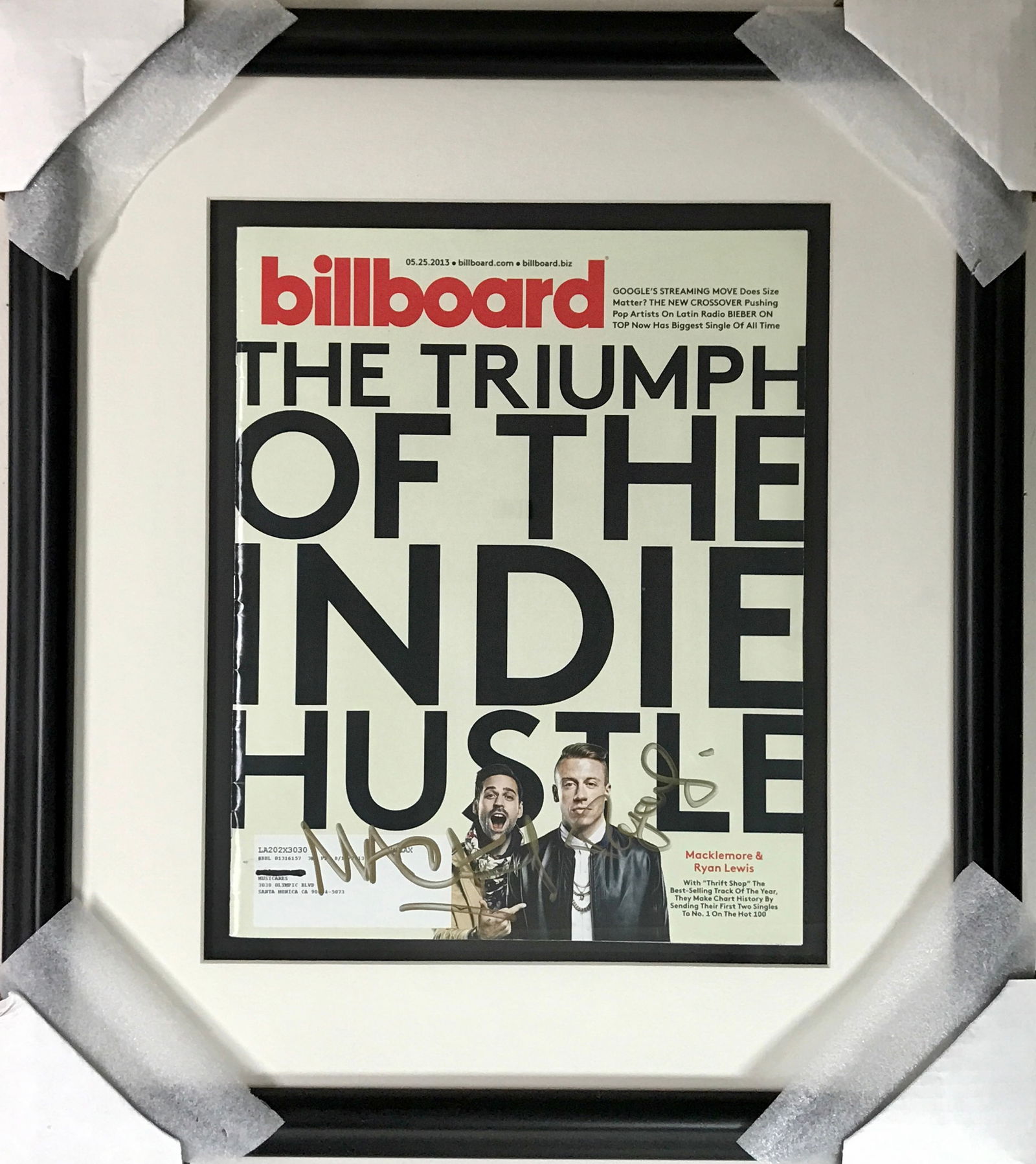 Macklemore Signed Rolling Stone Magazine: Rolling Stone magazine signed on the cover by Macklemore and Ryan Lewis. The May 25, 2013 issue features the duo on the cover, right after they won four Grammy Awards in 2014 including Best New Artist