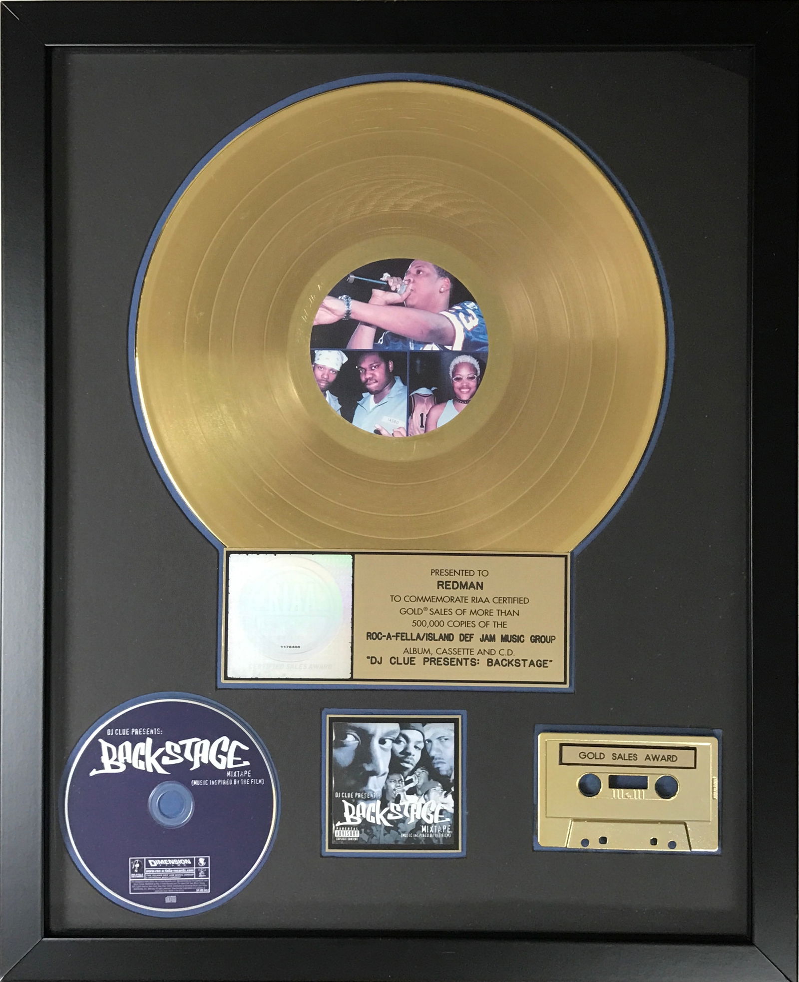 DJ Clue Mixtape Soundtrack RIAA Gold Album Award to Redman: RIAA Gold Album Award for DJ Clue Presents Backstage: Music Inspired by the Film, which is the soundtrack to the Chris Fiore 2000 documentary film Backstage. The award is presented to artist Redman. R