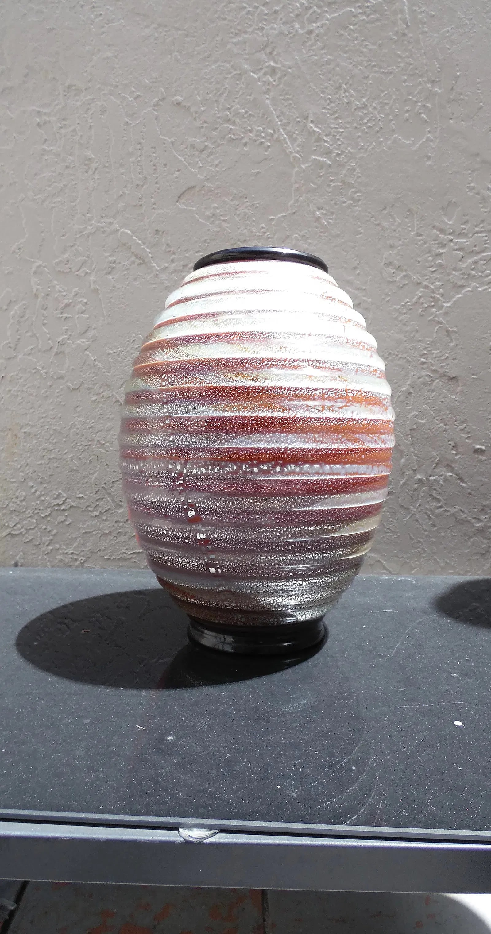 Seguso Vetri d'Arte Murano Art Glass Vase ( signed at the base ): DescriptionStriking art glass vase by Seguso Vetri d'Arte, Murano, Italy. Signed at the base ...Dimensions: 13" x 10" x 10" ... inThis handcrafted piece features a wide-bodied form with a narrow foot